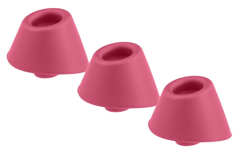 Drei pinke Ersatzkappen aus Silikon mit konischer Form und einer Öffnung oben.