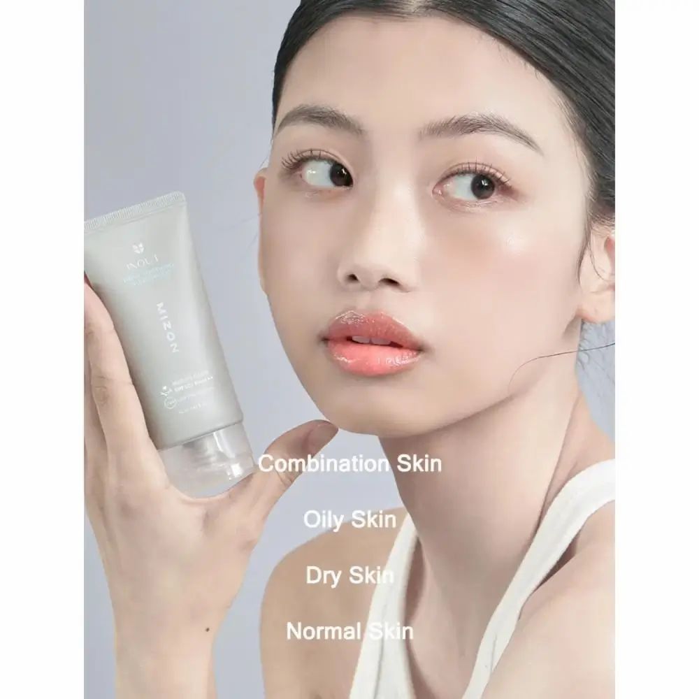 Frau hält Tube. Text: INOUT, MIZON. Text: Combination Skin, Oily Skin, Dry Skin, Normal Skin.