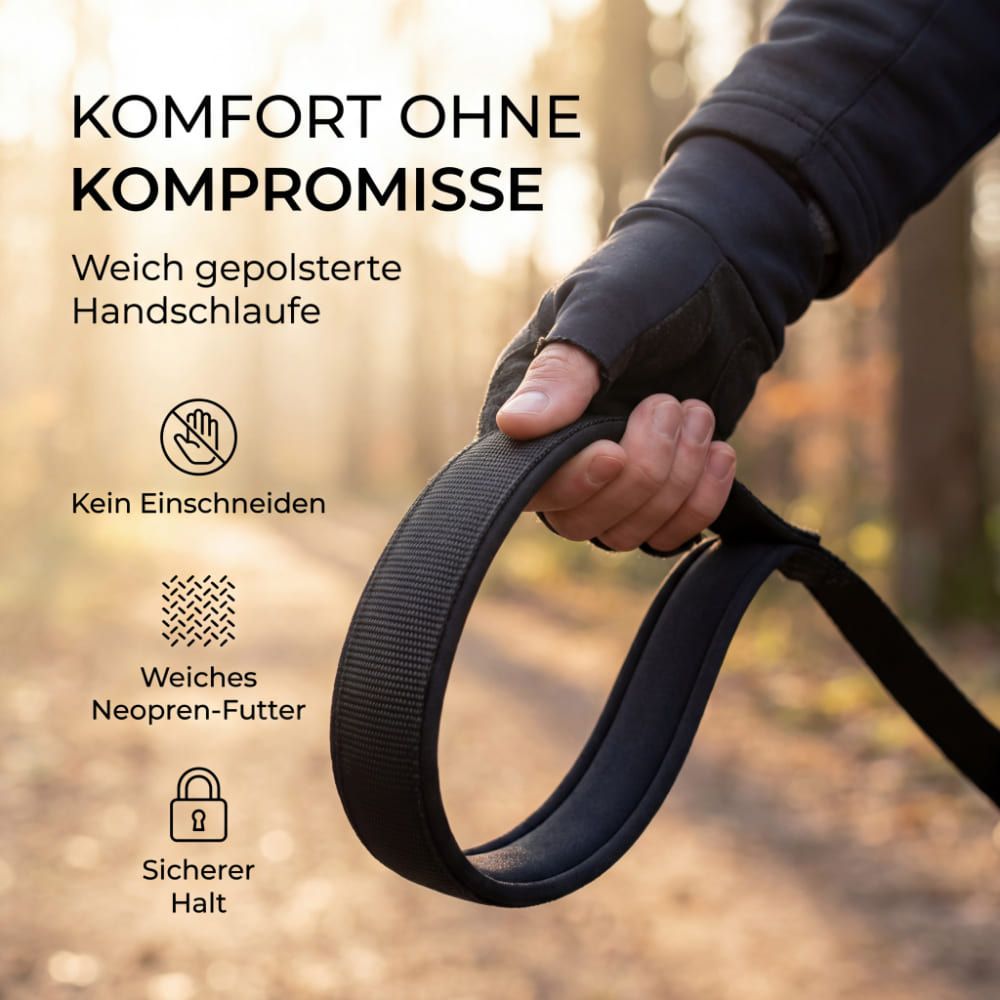 Schwarze Schleppleine mit gepolsterter Handschlaufe. Text: Komfort ohne Kompromisse. Weiches Neopren-Futter. Sicherer Halt.