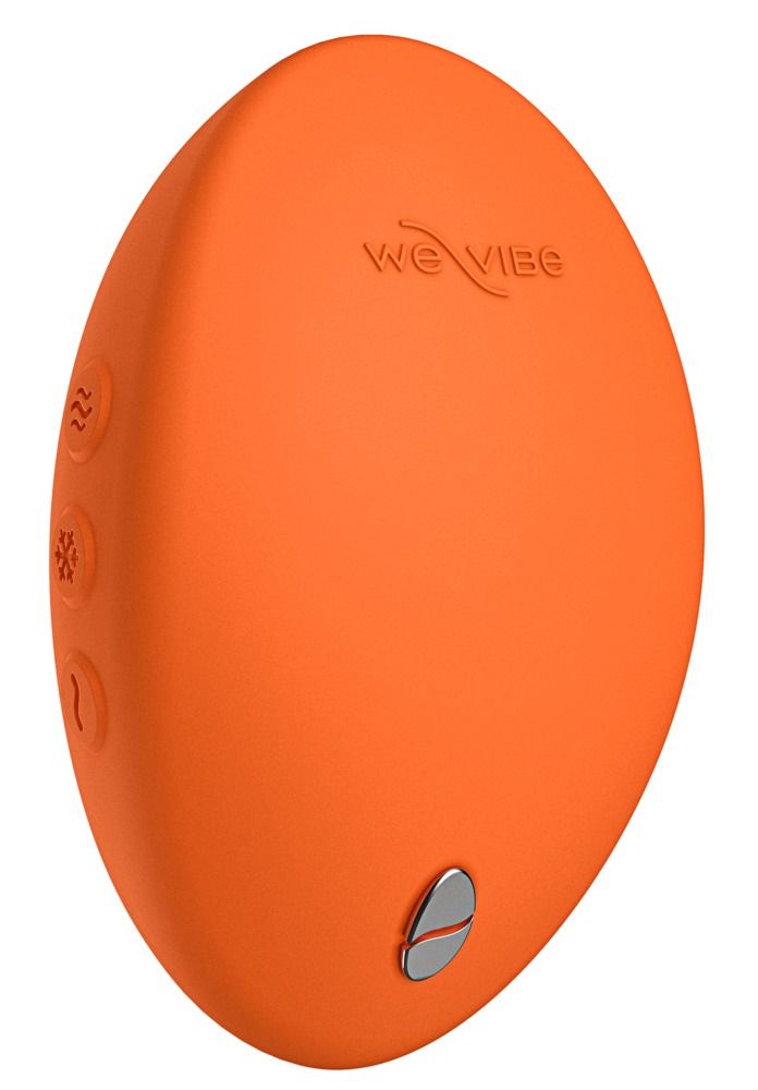 Orangefarbenes, ovales Gerät mit drei Knöpfen und einem silbernen Bereich mit "we vibe"-Logo. Die Oberfläche ist glatt.