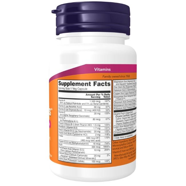 Flasche mit Vitaminpräparaten, Supplement Facts Etikett mit Nährwertangaben und Inhaltsstoffen.