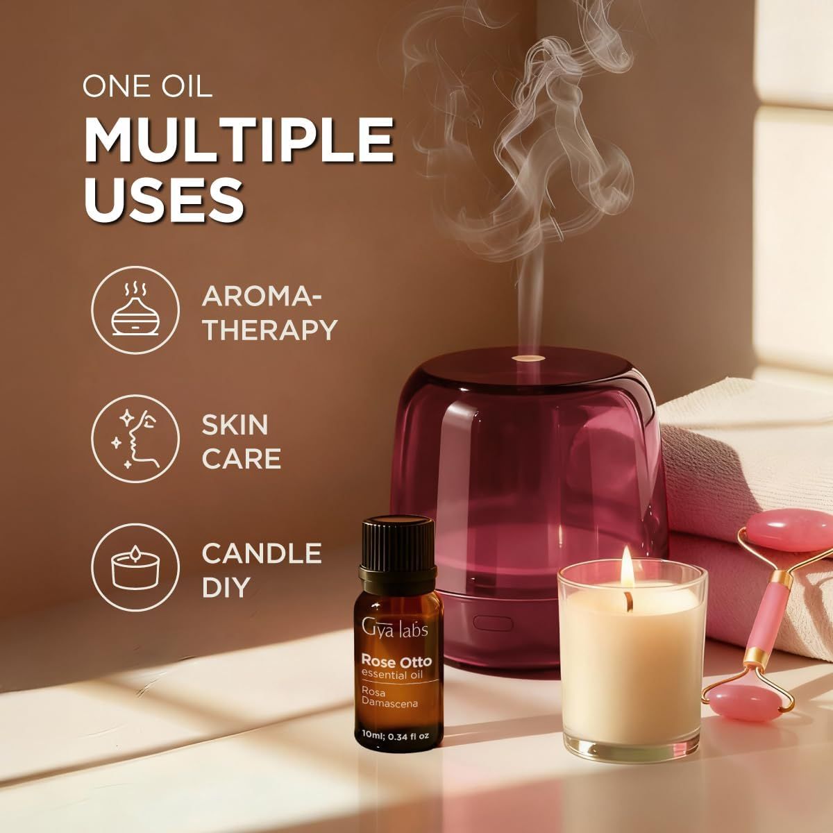 Diffusor, Ölflasche, Kerze und Rosenquarz-Gesichtsroller. Text: One Oil Multiple Uses. Symbole: Aromatherapie, Hautpflege, Kerze.