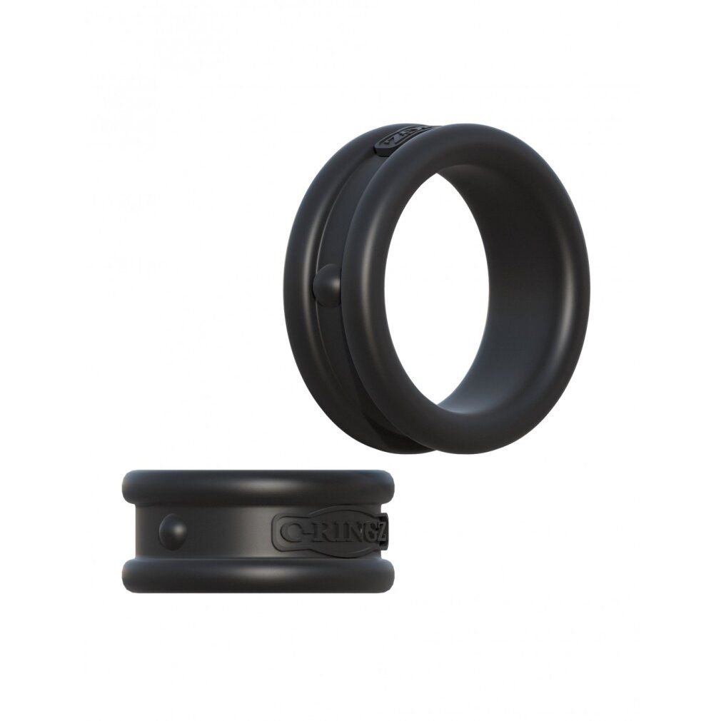Zwei schwarze Penisringe aus Silikon. Ein Ring hat eine Doppelring-Form, der andere ist flach.