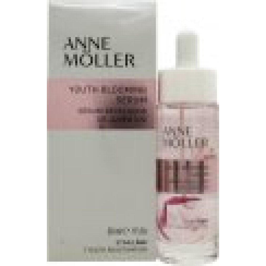 Serumflasche mit Verpackung. Aufschrift: Anne Möller Youth Blooming Serum. Rosa Etikett mit Produktnamen. Transparente Flasche mit Blüten.