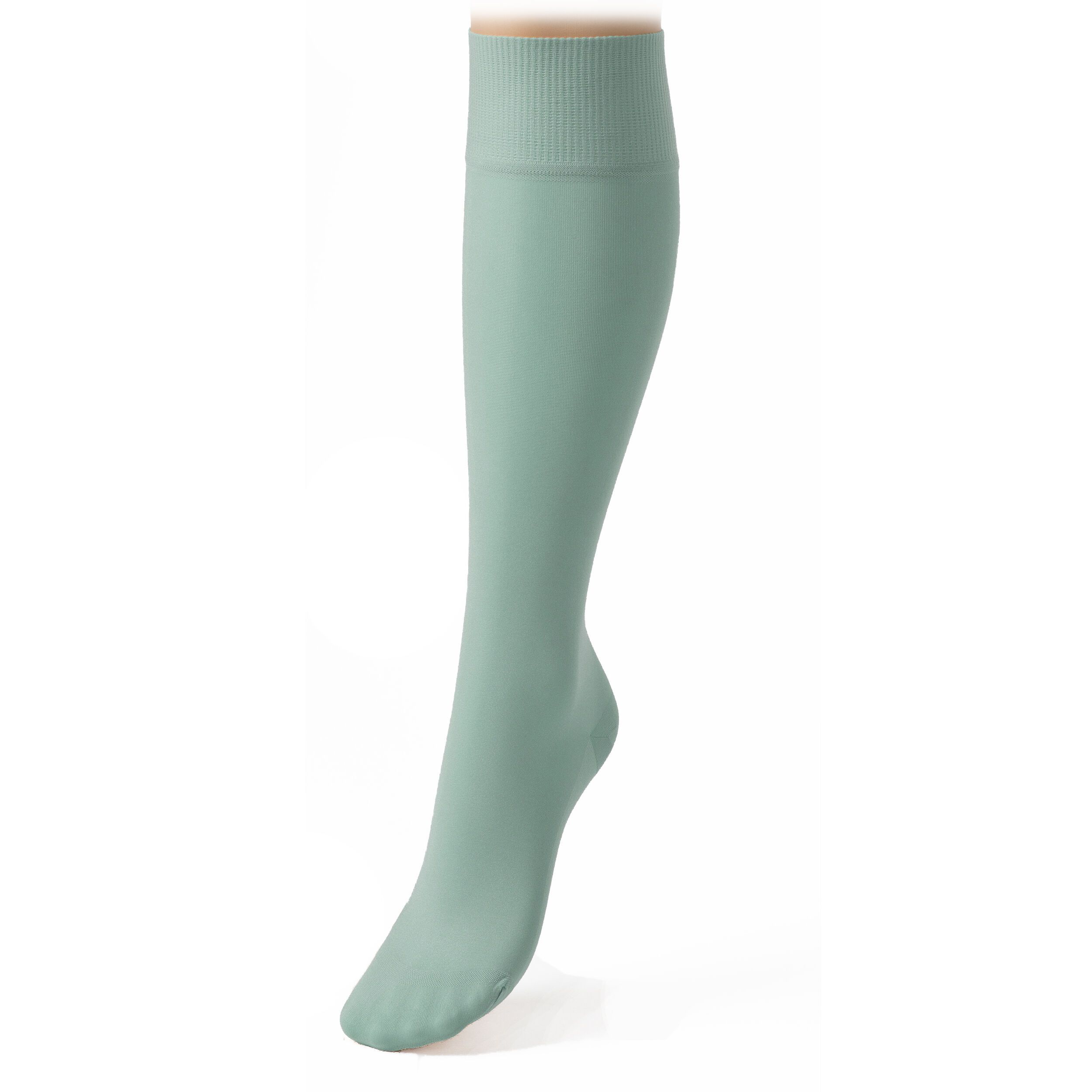 Kniestrümpfe auf einem Schaufensterpuppenbein. Hellgrüne, transparente Strümpfe mit geripptem Bund.