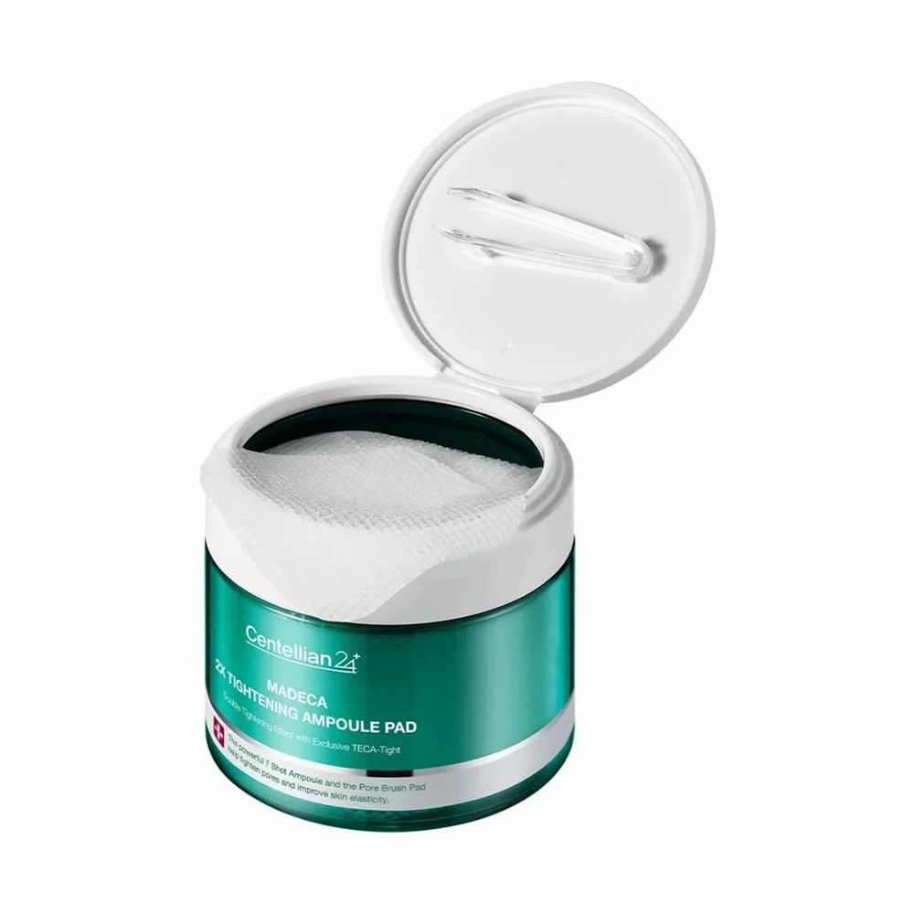 Grüner Behälter, offener Deckel. Pads sichtbar. Aufschrift: Centellian 24, Madeca.