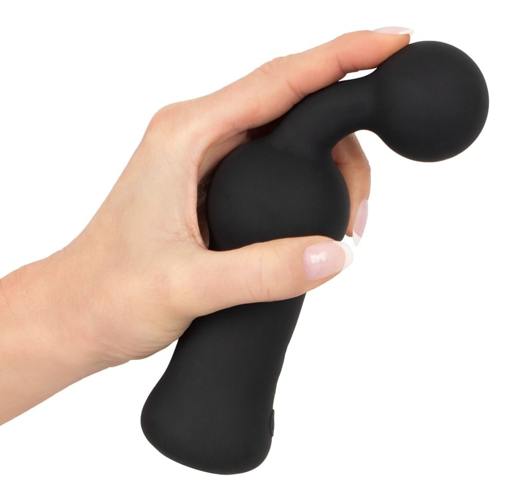 Schwarzer Vibrator in einer Hand gehalten. Kugelförmiger Kopf und abgerundeter Schaft.