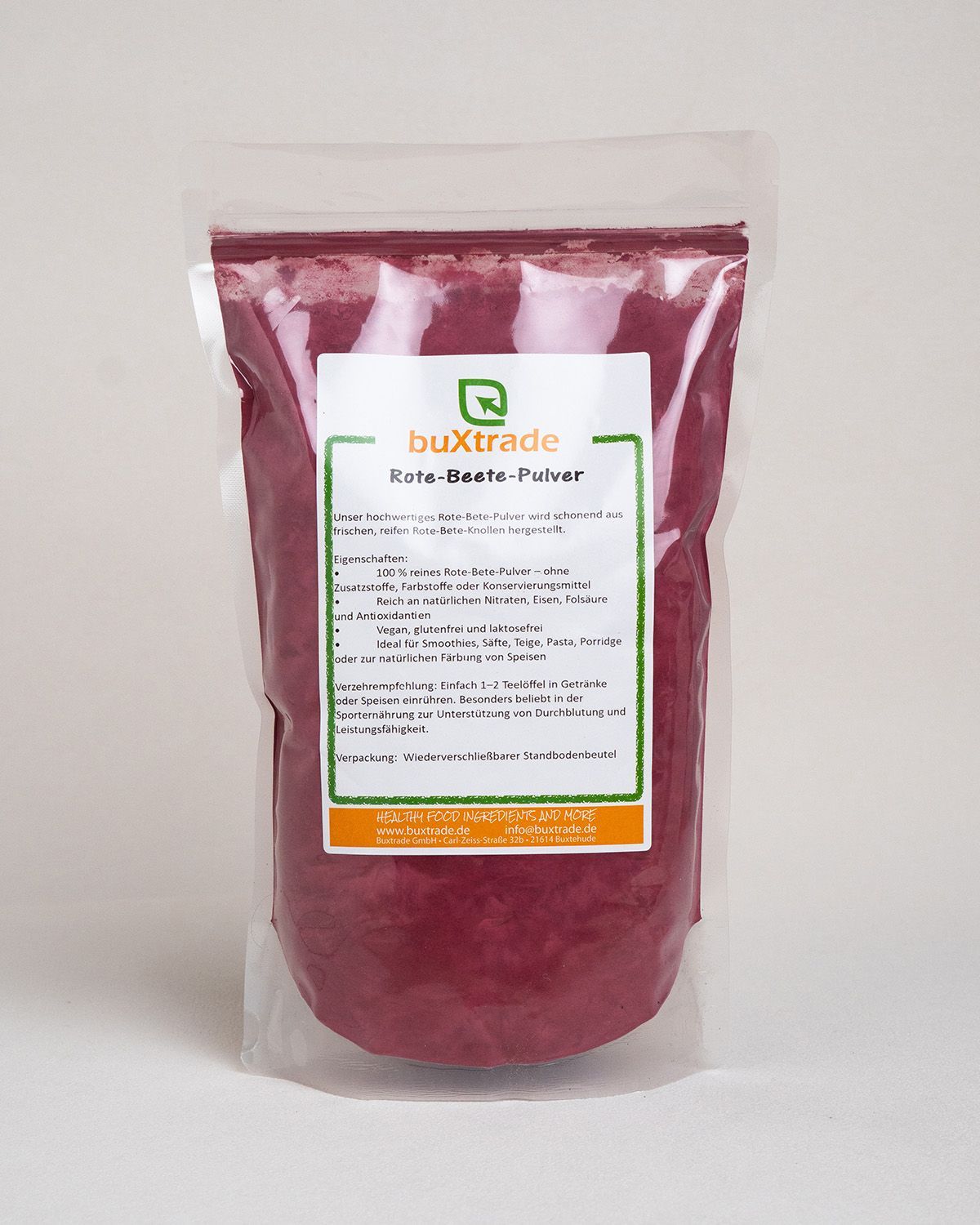 Verpackung von buXtrade Rote-Bete-Pulver. Transparente Tüte mit Etikett. Text in Deutsch.