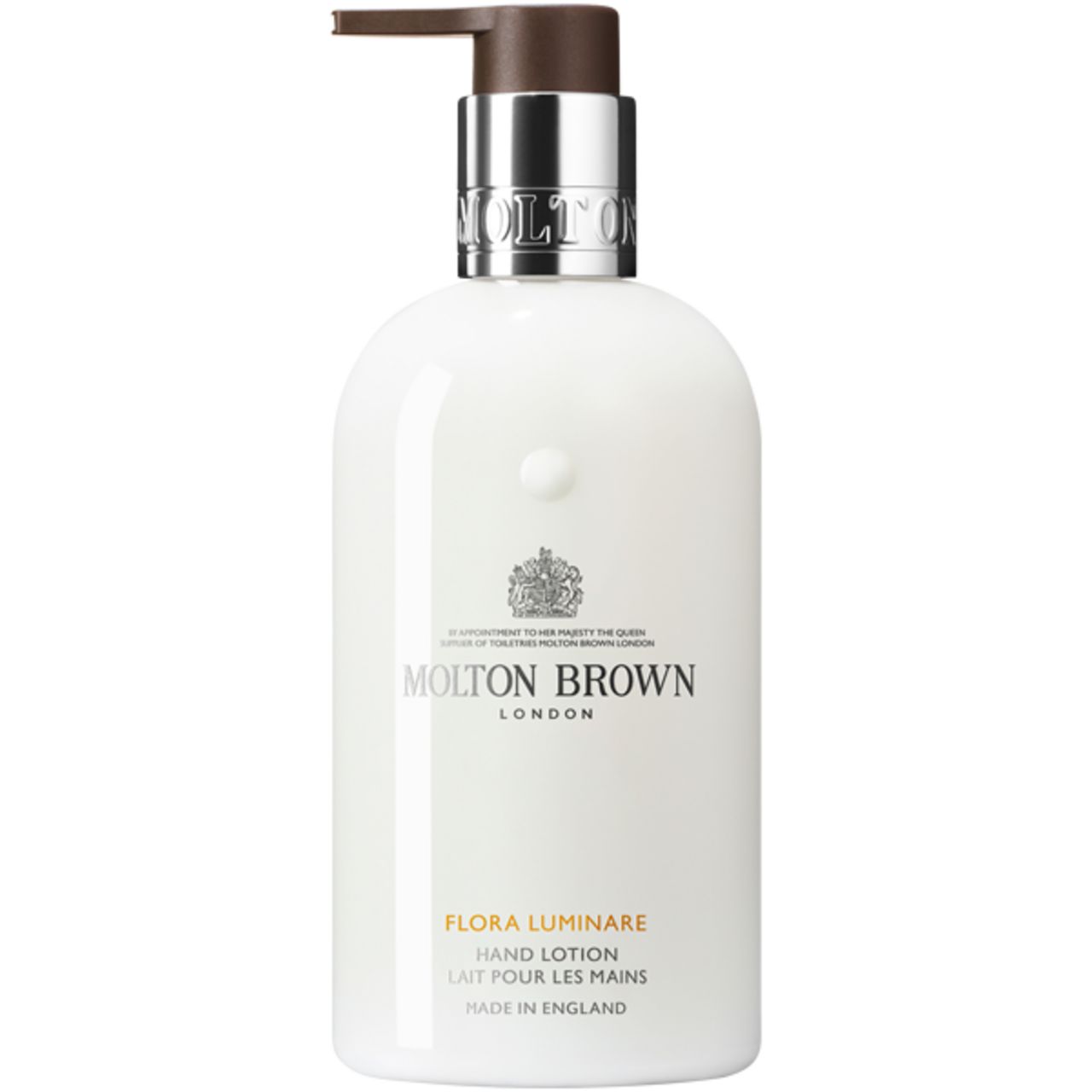 Weiße Flasche Molton Brown Flora Luminare Handlotion mit Pumpe. Silberner Pumpkopf, braune Spitze. Produktname und Marke sichtbar.