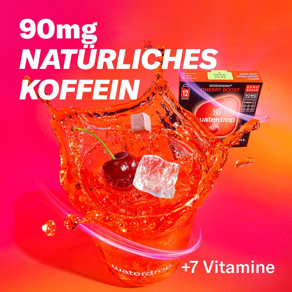 Ein Spritzer Kirschgetränk mit waterdrop® Microenergy Cherry Boost Würfeln und einer Kirsche.