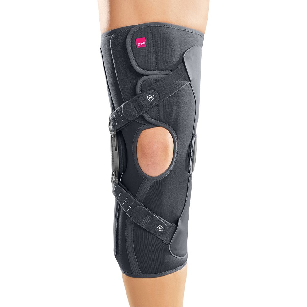 Graue Kniebandage mit seitlichen Scharnieren und verstellbaren Klettverschlüssen.