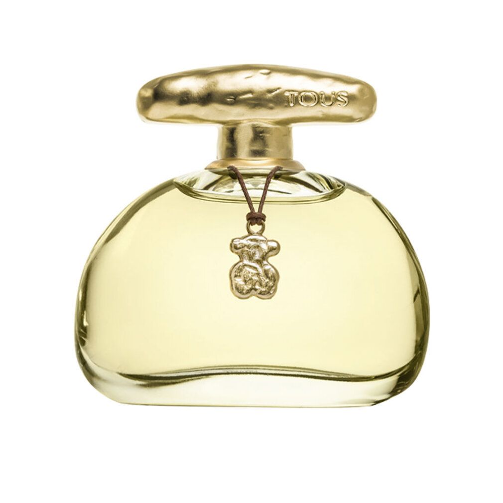 Parfümflasche mit goldfarbenem Verschluss und Anhänger. Flasche mit klarer Flüssigkeit. Anhänger in Bärenform.
