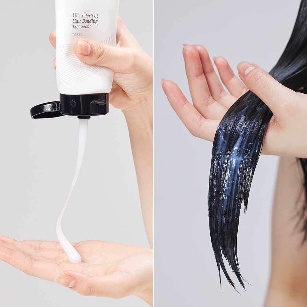 Zwei Hände: Eine presst weiße Creme aus einer Tube, die andere hält nasses, dunkles Haar.