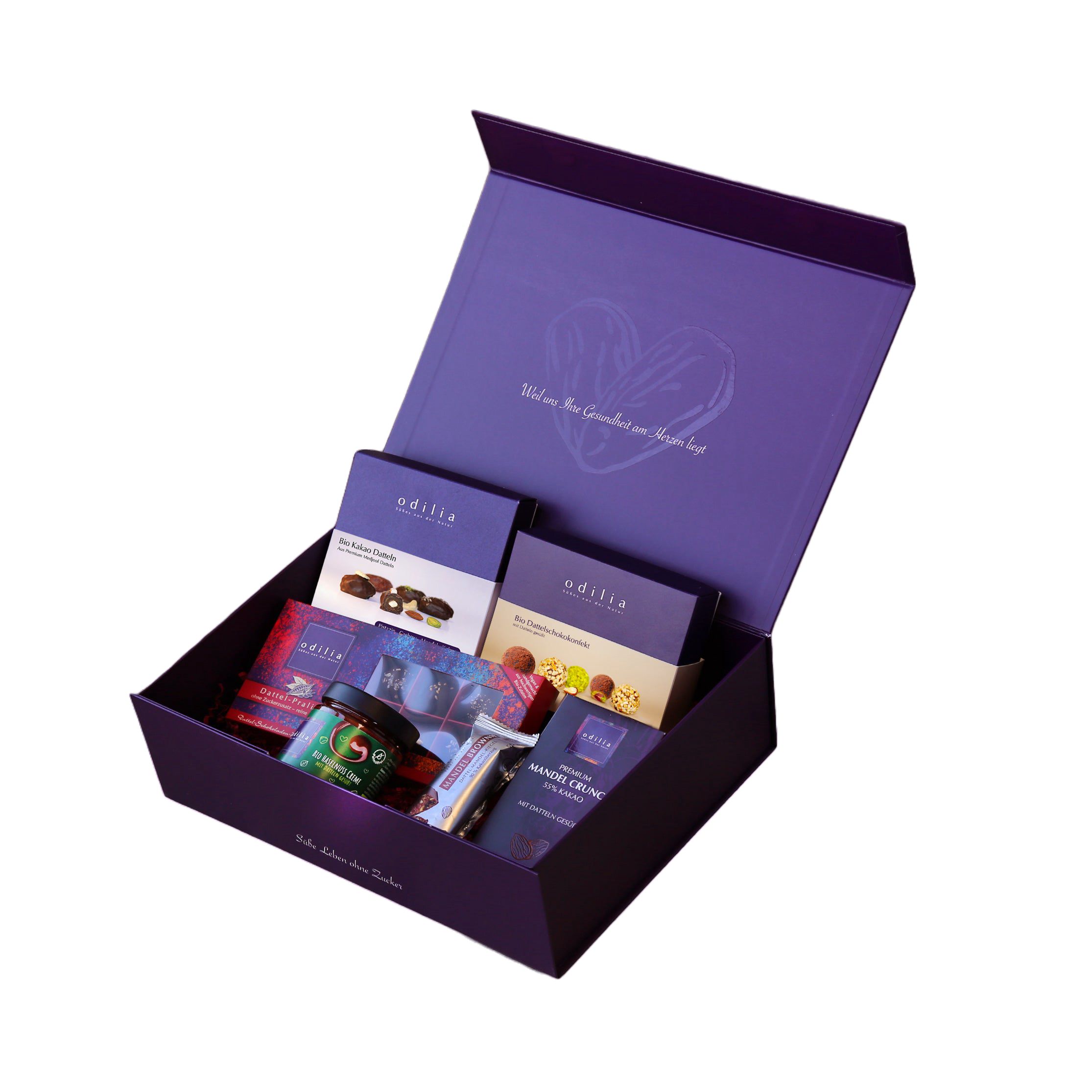 Lila Geschenkbox mit verschiedenen Odilia Schokoladen und Pralinen.