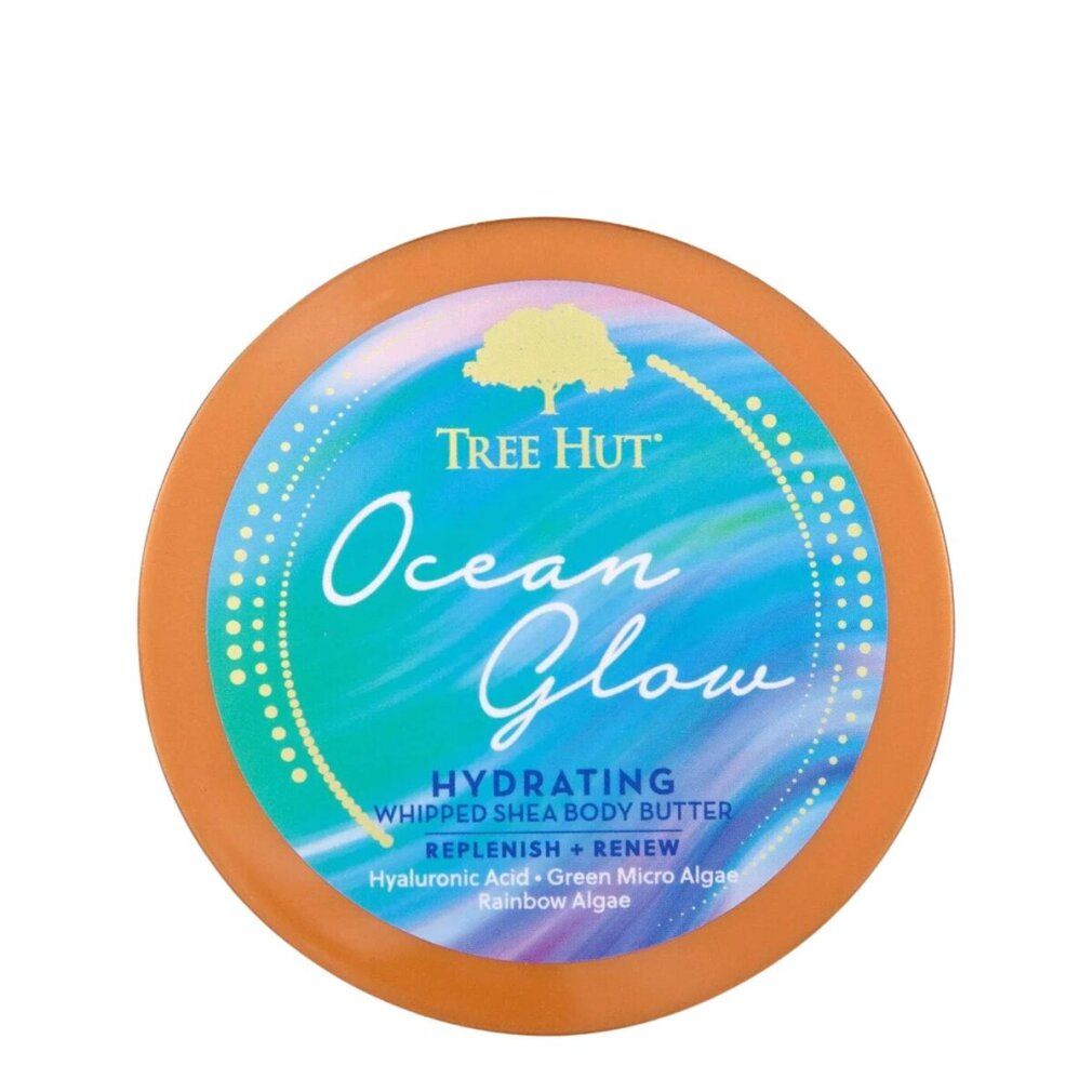 Orangefarbener Behälter mit runder Deckel-Etikettierung für Tree Hut Ocean Glow Whipped Shea Body Butter.