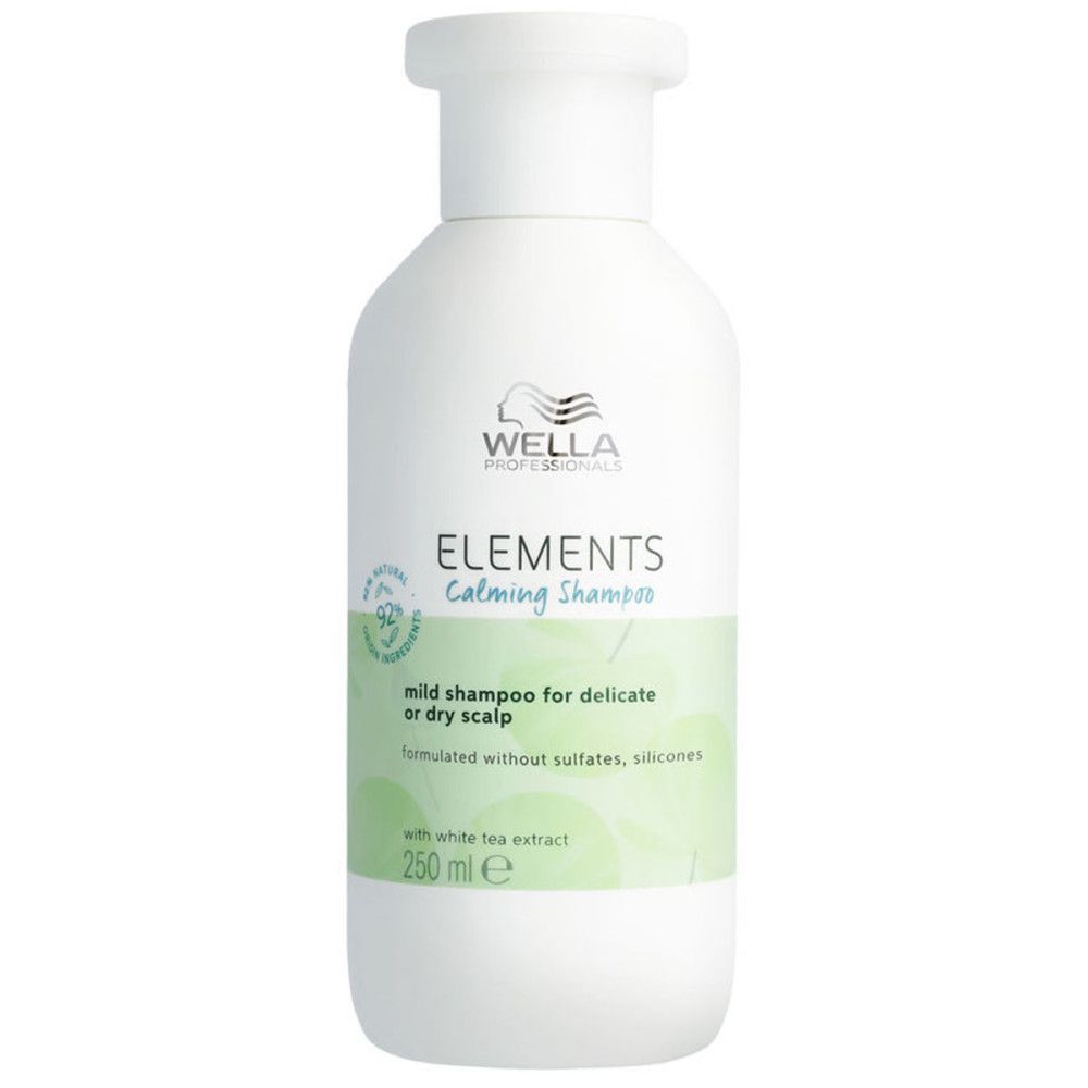 Weiße Shampoo-Flasche mit grünem Etikett. Aufschrift: ELEMENTS Calming Shampoo. 250 ml.