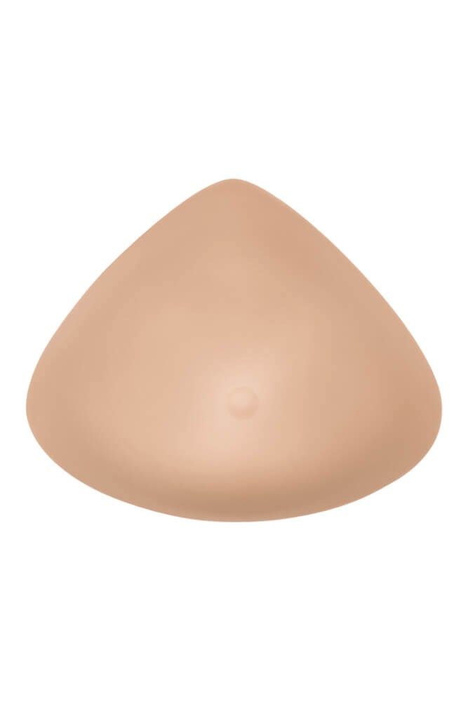 Hautfarbene Brustprothese in Tropfenform. Glatte Oberfläche. Keine sichtbaren Merkmale.