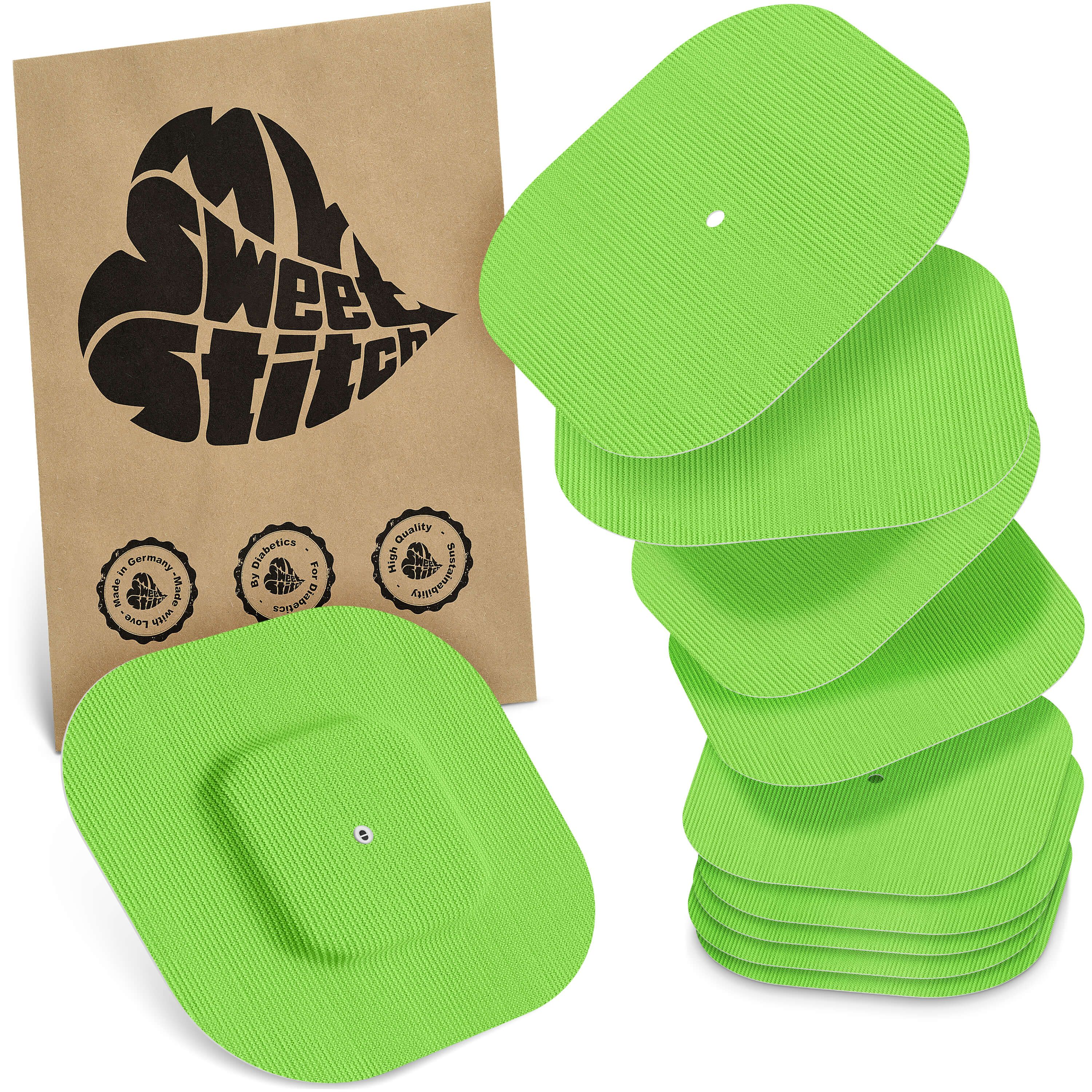 Grüne, quadratische Pflaster mit einem kleineren, quadratischen Mittelteil. Auf brauner Verpackung ist der Schriftzug "MySweetStitch" zu sehen.