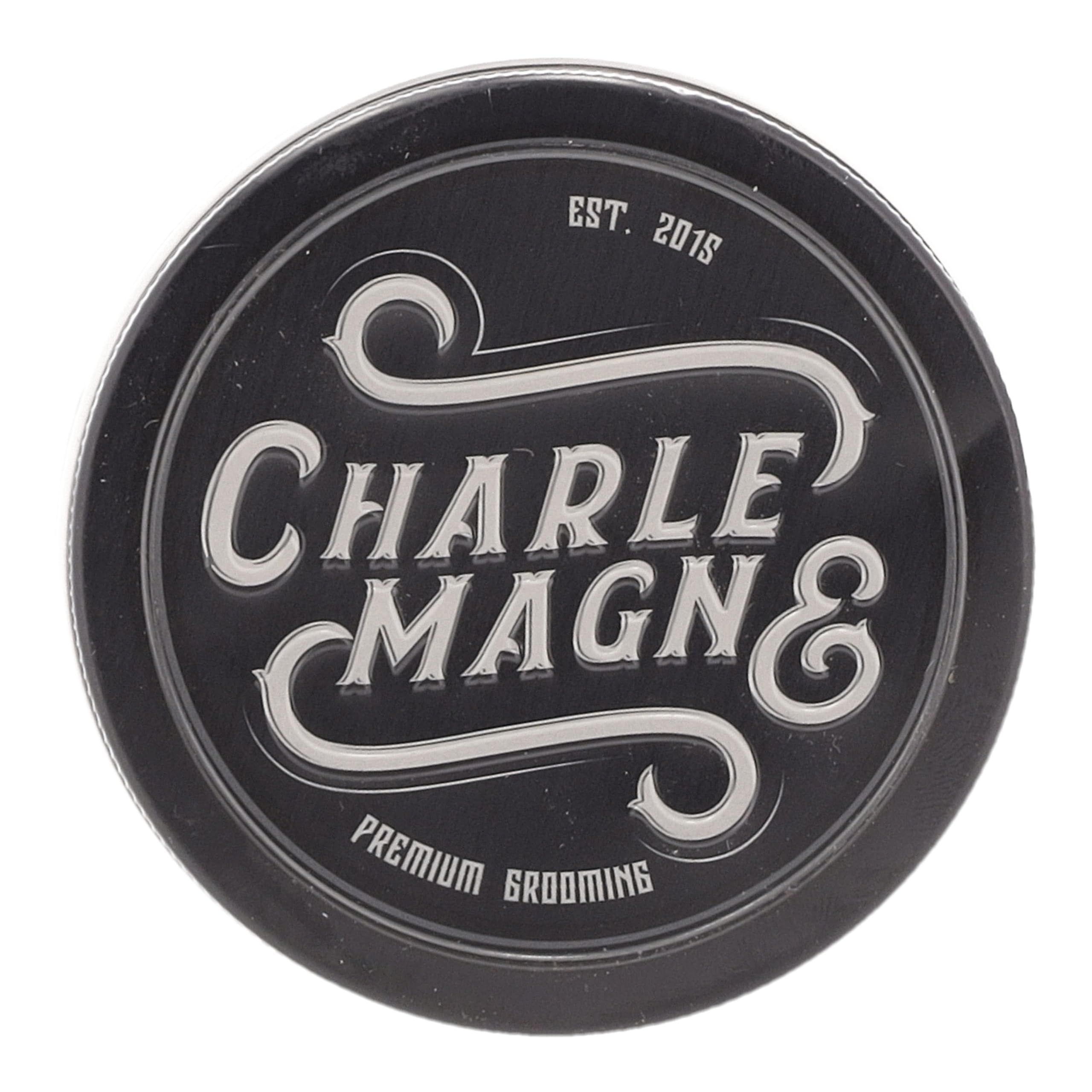 Schwarzer Deckel mit silbernem Schriftzug "CHARLE MAGN & PREMIUM GROOMING".