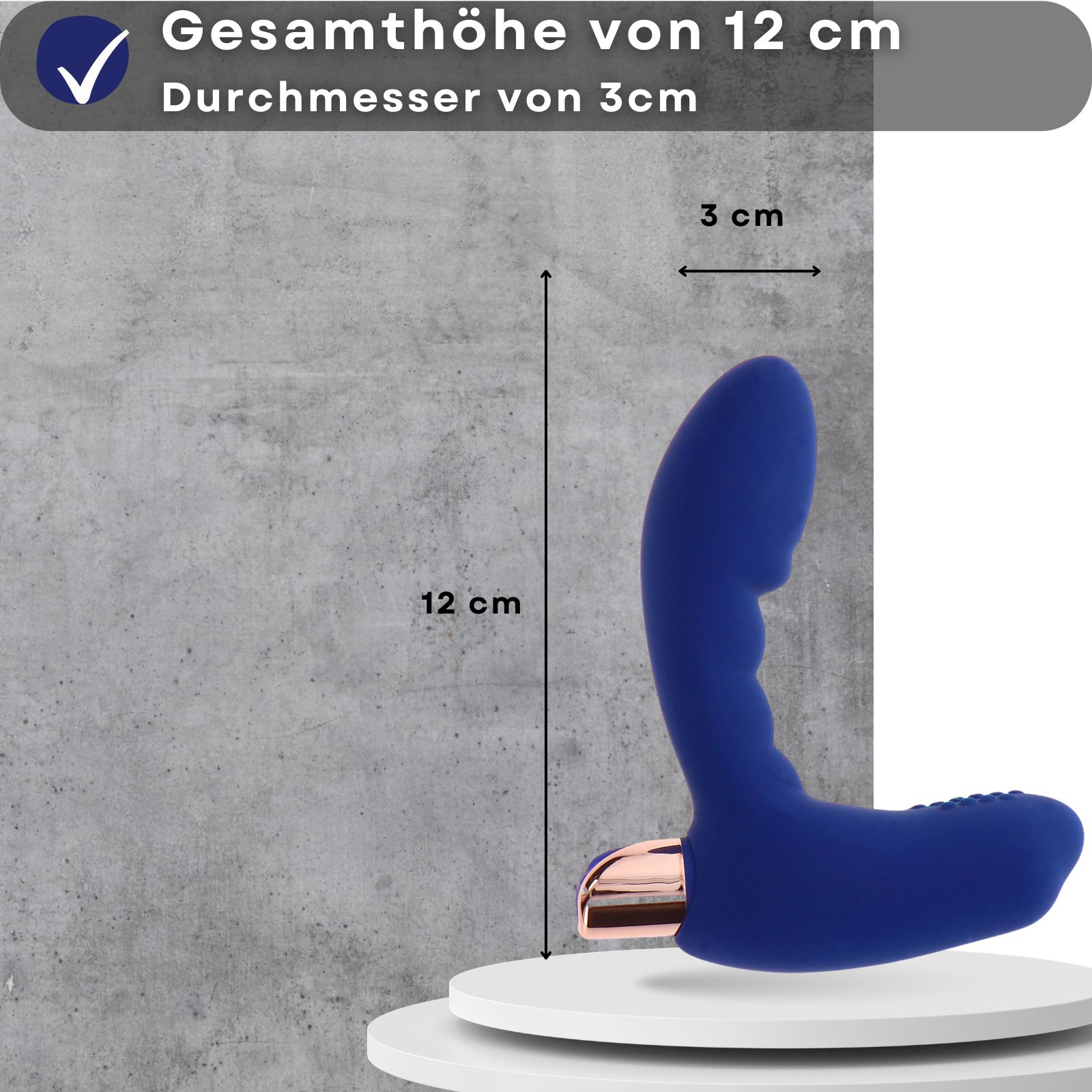 Blauer Analplug mit goldfarbenem Akzent. 12 cm hoch, 3 cm Durchmesser. Auf Podest.