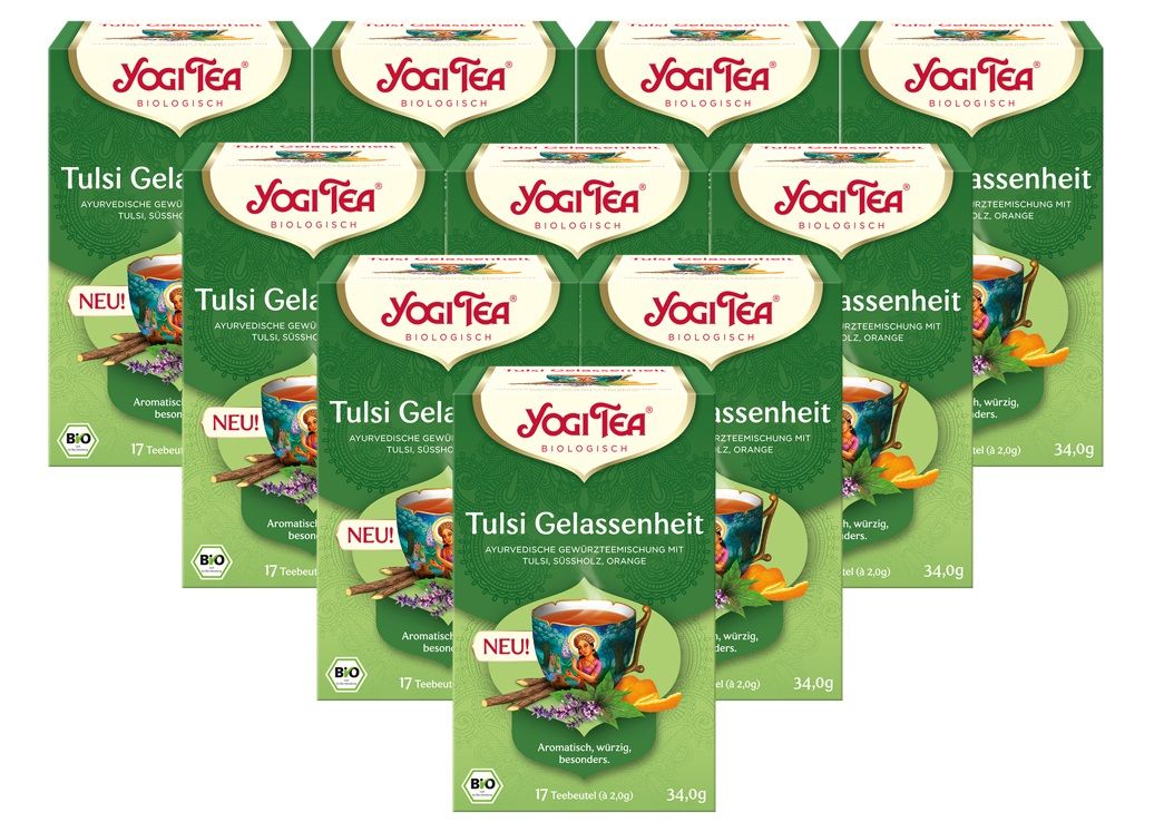 Mehrere grüne Teepackungen mit dem Logo von Yogi Tea. Aufschrift: Tulsi Gelassenheit, Bio. Mit Zutatenabbildung.