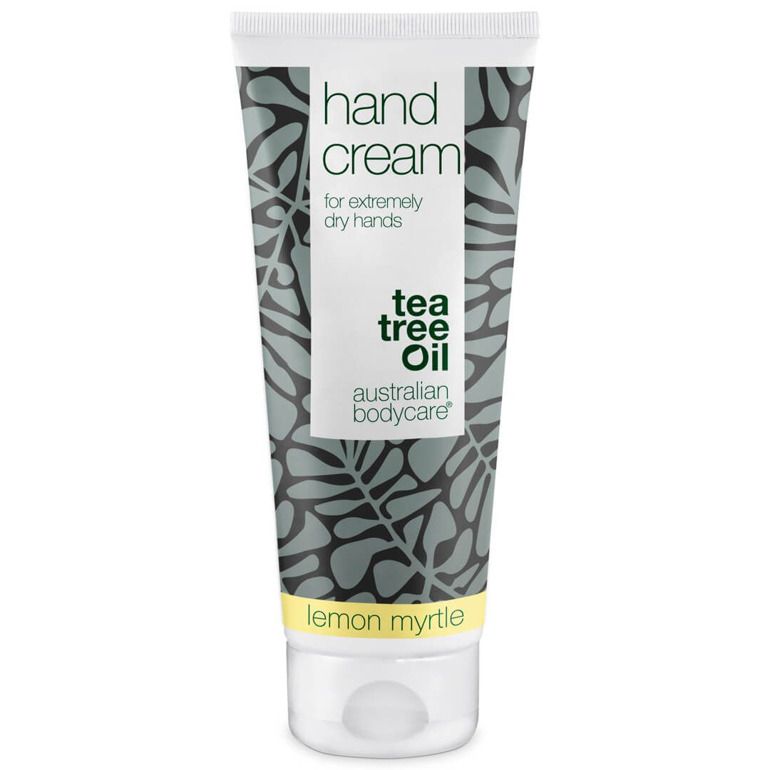 Handcreme-Tube mit Aufschrift 'Hand Cream' und 'Tea Tree Oil'.