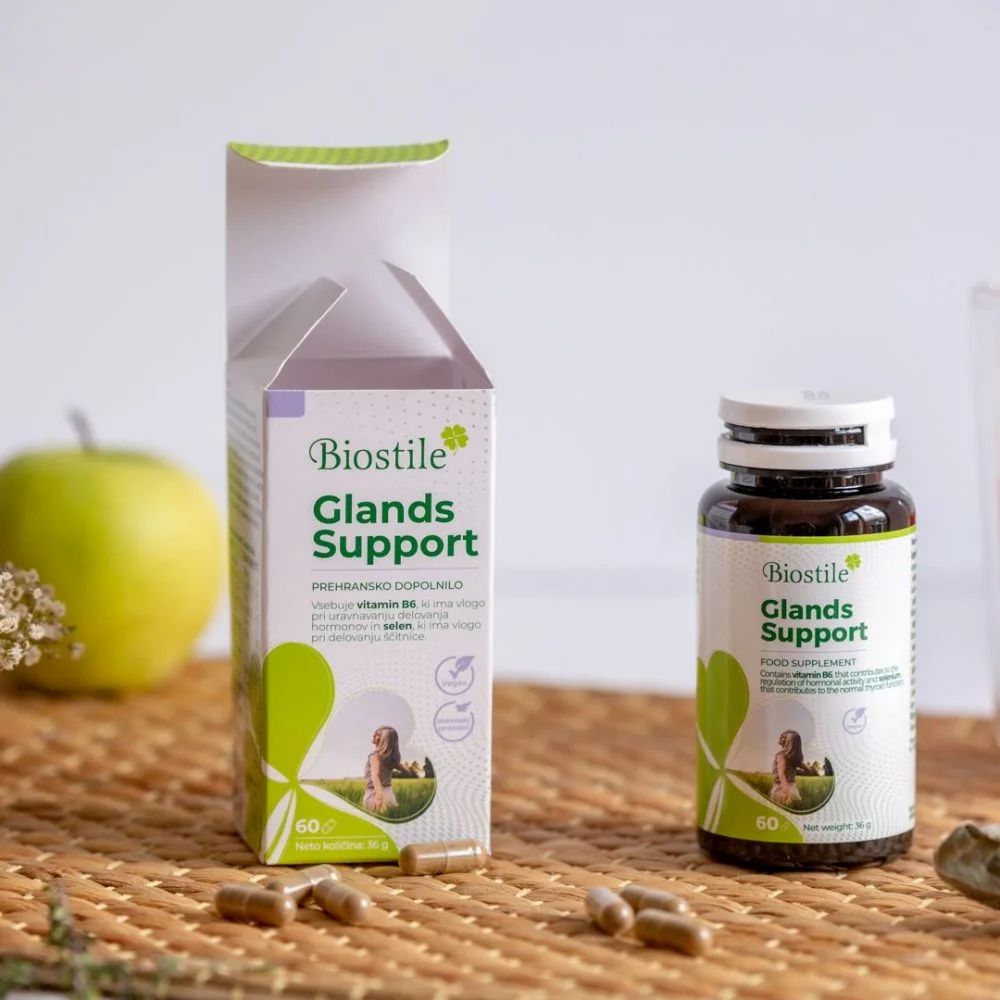 Produktverpackung mit Flasche und Kapseln. Aufschrift: Biostile Glands Support. Grün-weißes Design. Flasche mit 60 Kapseln.