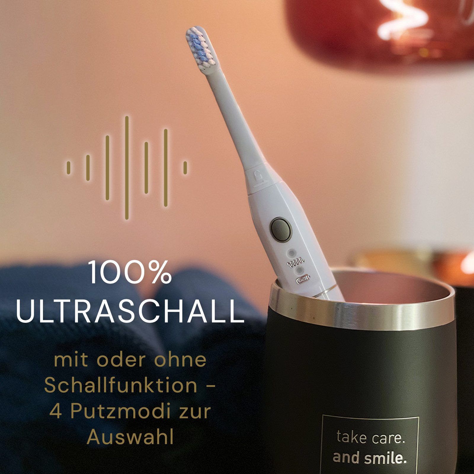 Weiße elektrische Zahnbürste in einem Becher. Auf der Zahnbürste steht MEGASONEX. Text: 100% Ultraschall, 4 Putzmodi zur Auswahl.