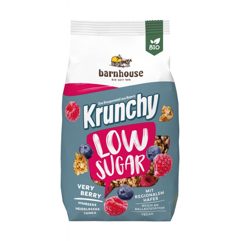 Verpackung mit Krunchy Low Sugar. Aufschrift: Very Berry, Himbeere, Heidelbeere, Tonka. Bio-Siegel. Vegan.