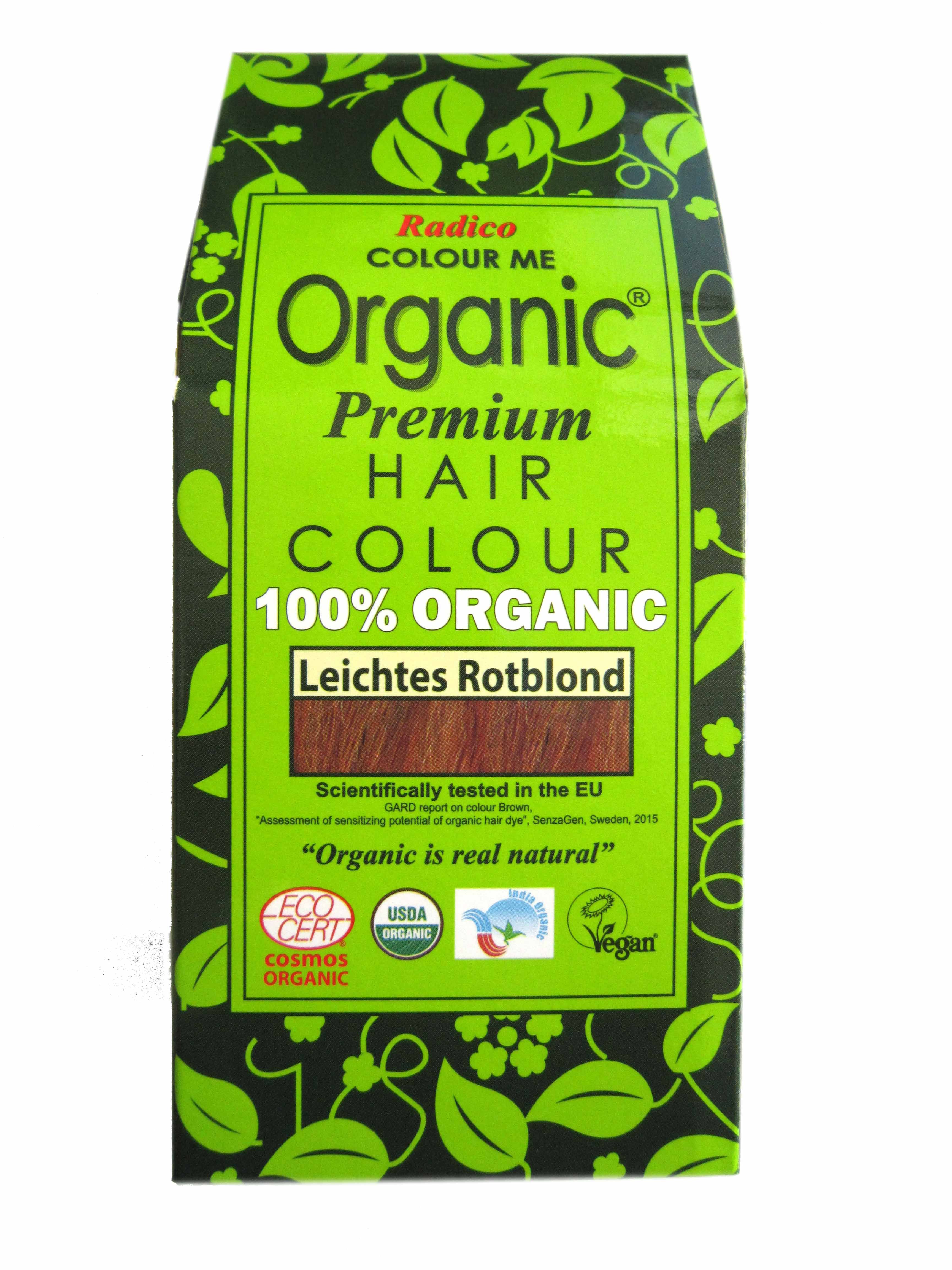 Verpackung mit Pflanzenhaarfarbe. Aufschrift: Organic, Premium Hair Colour, 100% Organic, Leichtes Rotblond. Zertifizierungen.