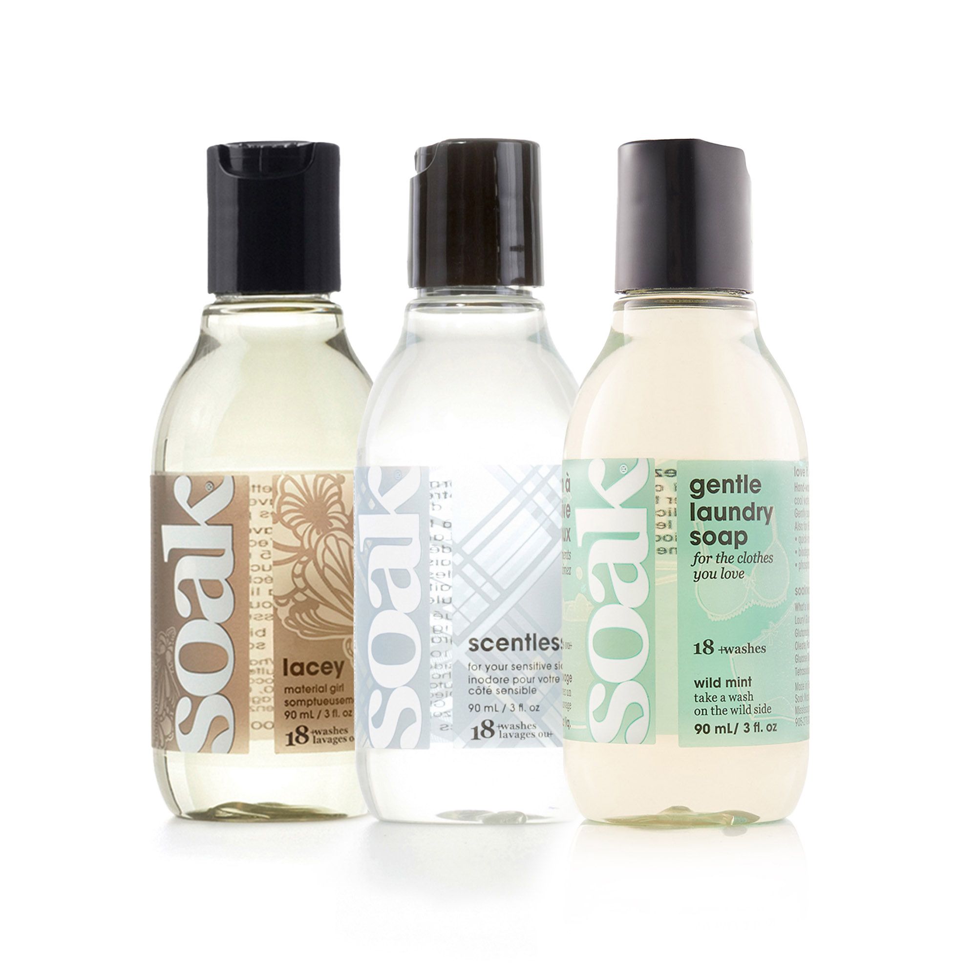 Drei Flaschen mit schwarzem Deckel. Aufschrift "soak" und verschiedene Produktbezeichnungen. 18 Waschgänge.