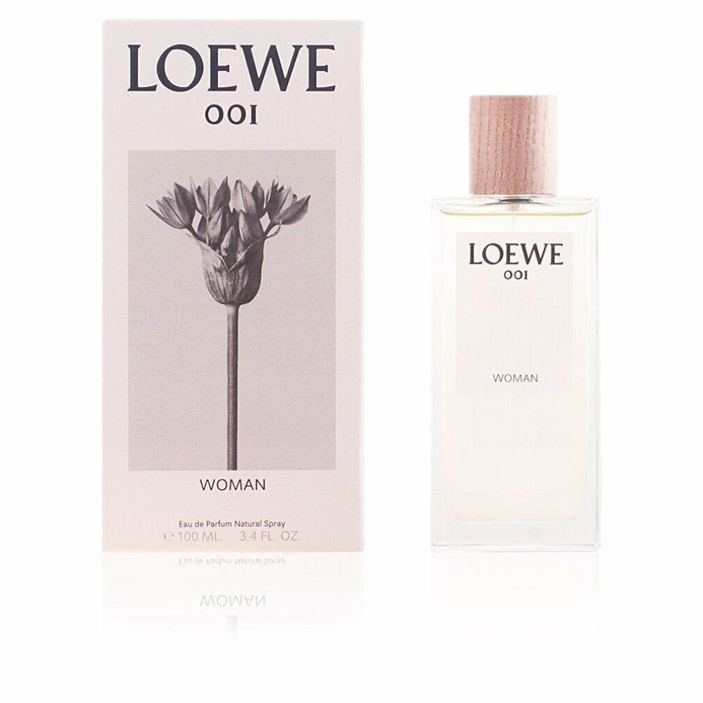 Loewe 001 Woman Edp Spray und Verpackung. Rechteckiger Flakon neben weißer Schachtel mit floralem Motiv und Schriftzug.