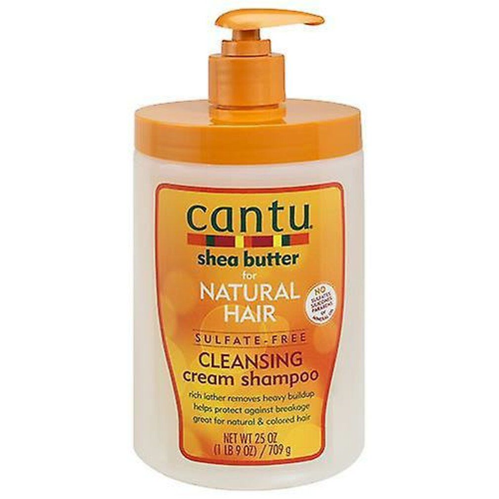 Shampoo-Flasche mit Pumpverschluss. Aufschrift: Cantu, Shea Butter, für Natural Hair, Cleansing Cream Shampoo. Orange und Weiß.