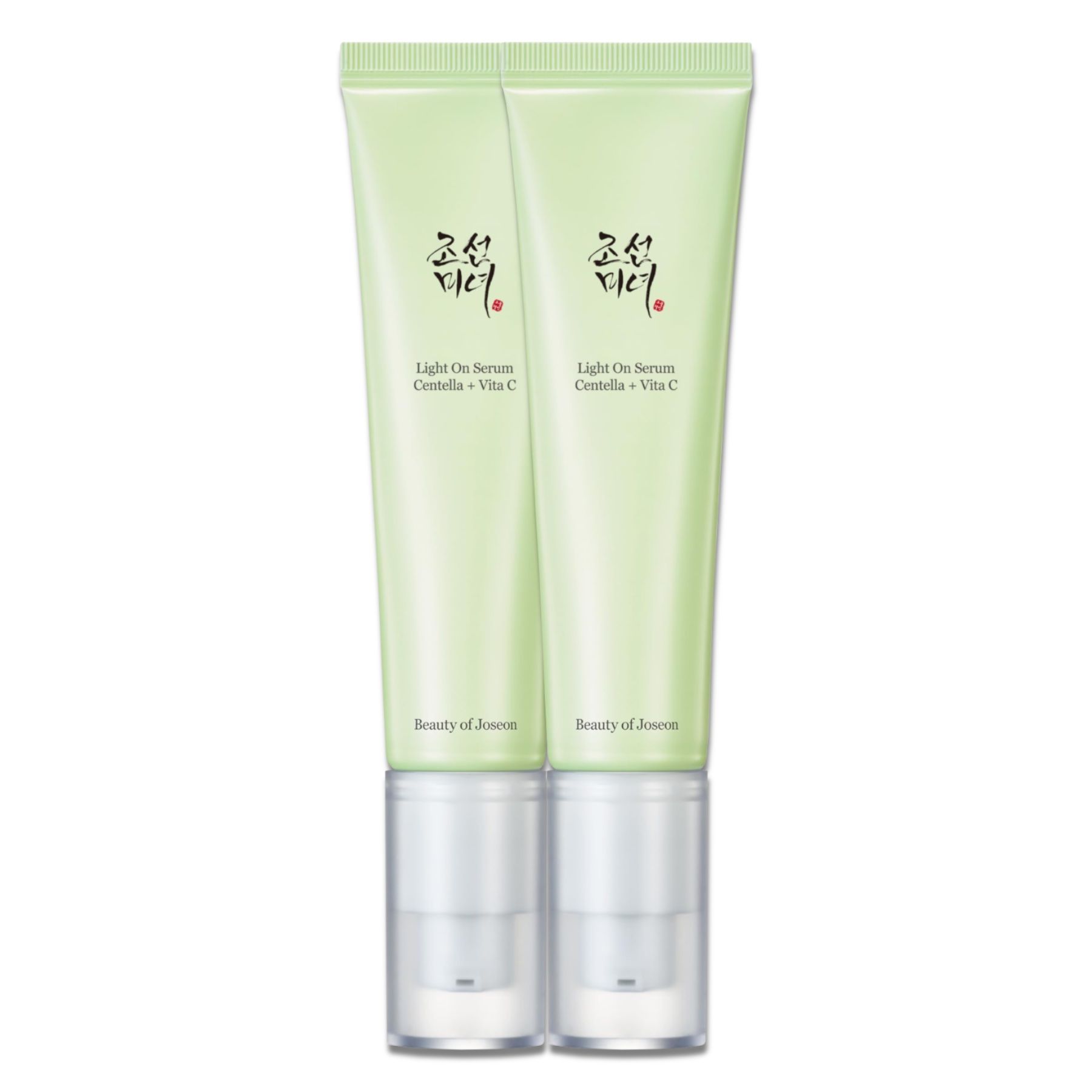 Zwei grüne Tuben Beauty of Joseon Light On Serum. Aufschrift: Centella + Vitamin C. Mit Pumpaufsatz.