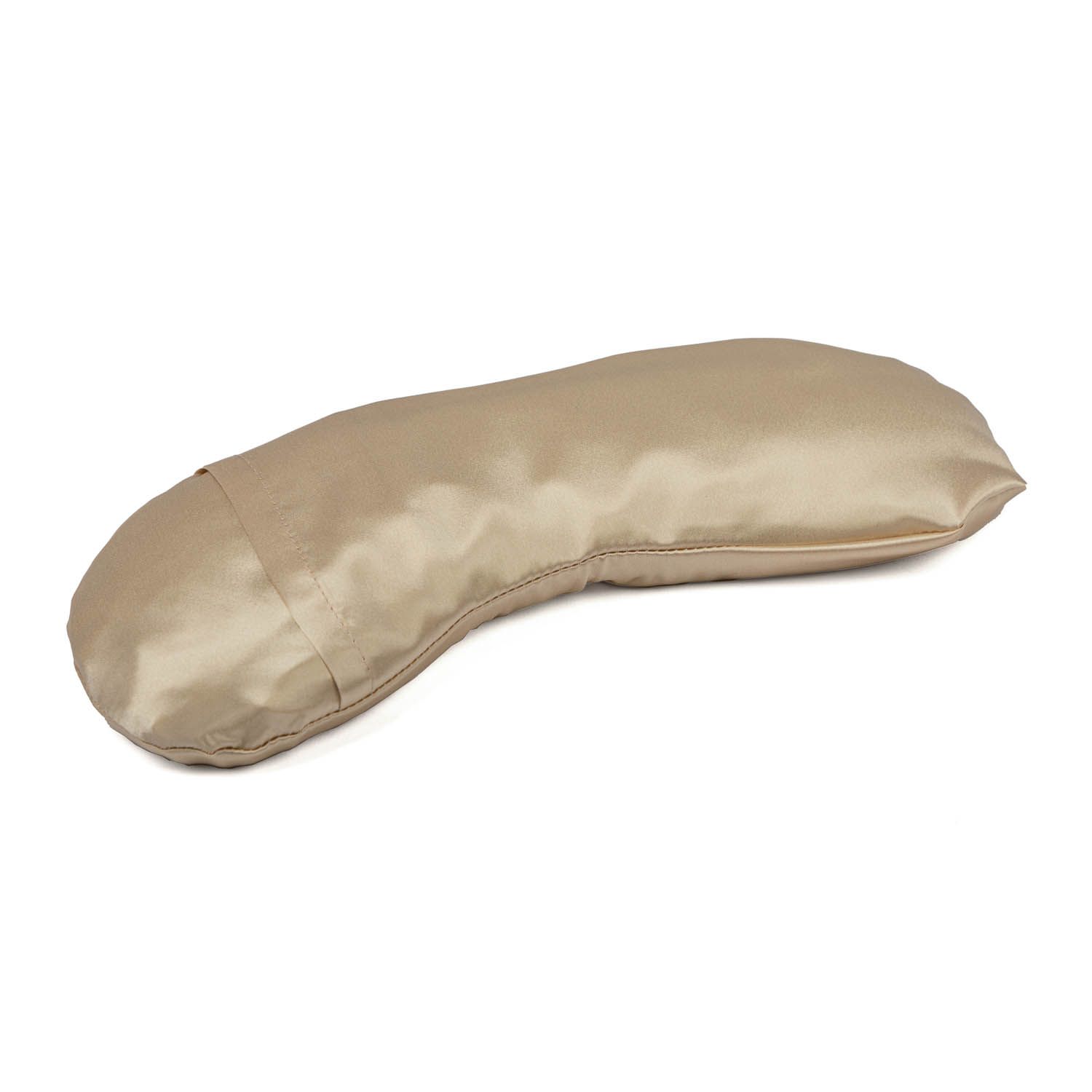 Beiges Augenkissen, länglich, gebogene Form. Seidenartiges Material. Naht an der Seite.