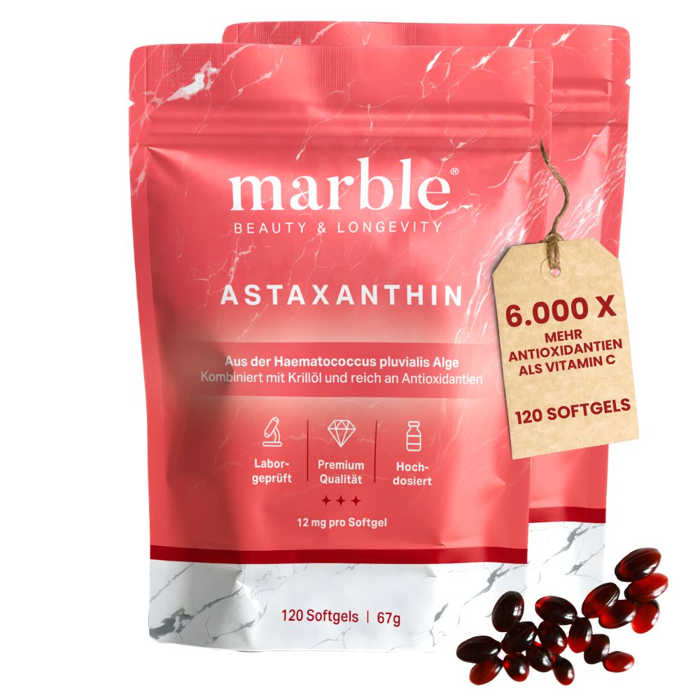 Zwei rosa Beutel mit Softgels. Text: marble, Astaxanthin, 12 mg pro Softgel, 120 Softgels. Aufschrift: 6.000X mehr Antioxidantien als Vitamin C.