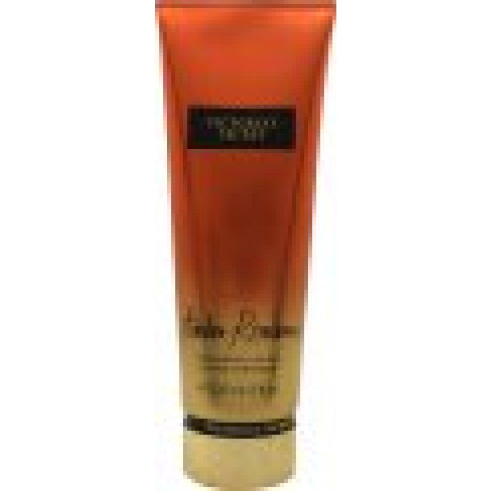 Körperlotion Victoria's Secret Amber Romance. Orangefarbene Tube mit schwarzem Etikett. Produktname und Marke sind sichtbar.