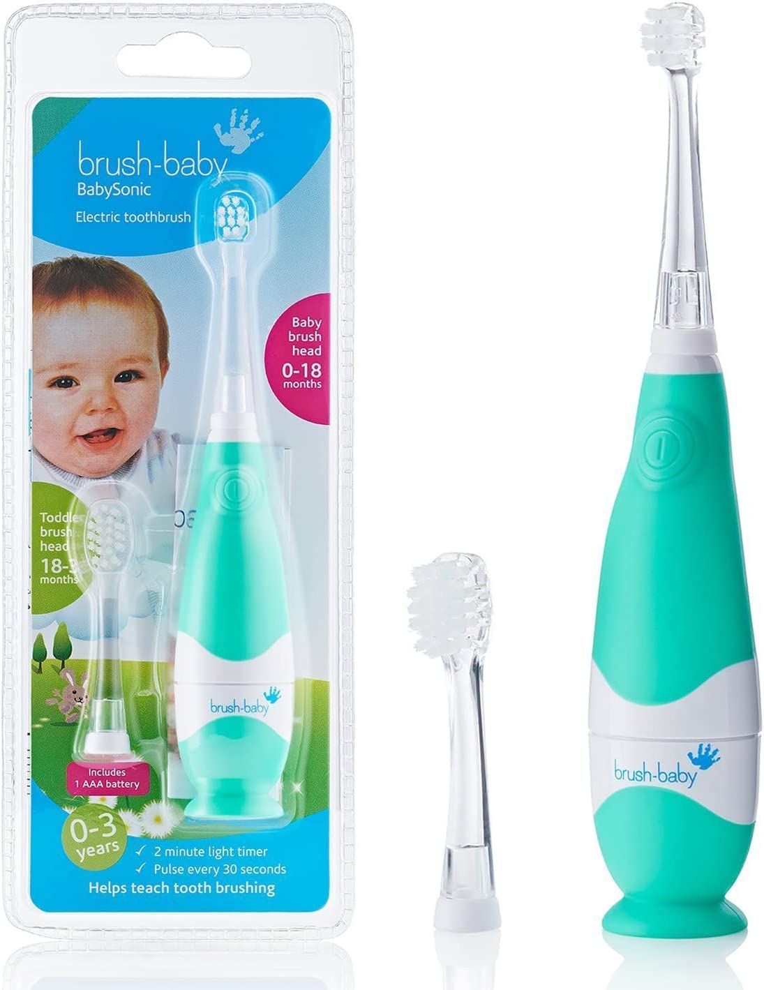 Elektrische Zahnbürste, grün-weiß, mit zwei Bürstenköpfen und Verpackung. Marke: brush-baby. Für 0-3 Jahre.