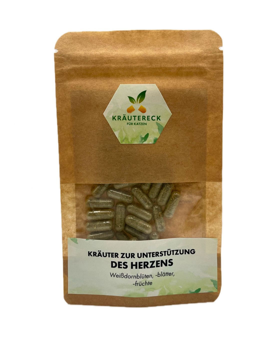 Kräuterkapseln in brauner Verpackung mit Sichtfenster. Aufkleber mit Logo und Text: Kräuter zur Unterstützung des Herzens.