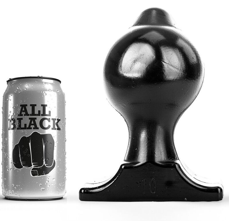 Schwarzer Analplug neben einer Dose. Dose mit ALL BLACK und Faust-Symbol. Glänzende Oberfläche.