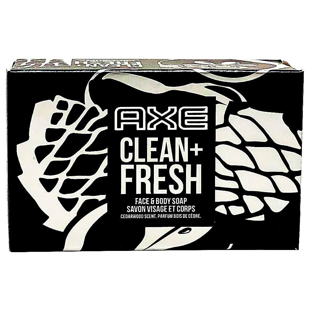 Schwarze Verpackung mit weißem Muster und AXE CLEAN+ FRESH Schriftzug. Text: FACE & BODY SOAP, SAVON VISAGE ET CORPS, Zedernholzduft.
