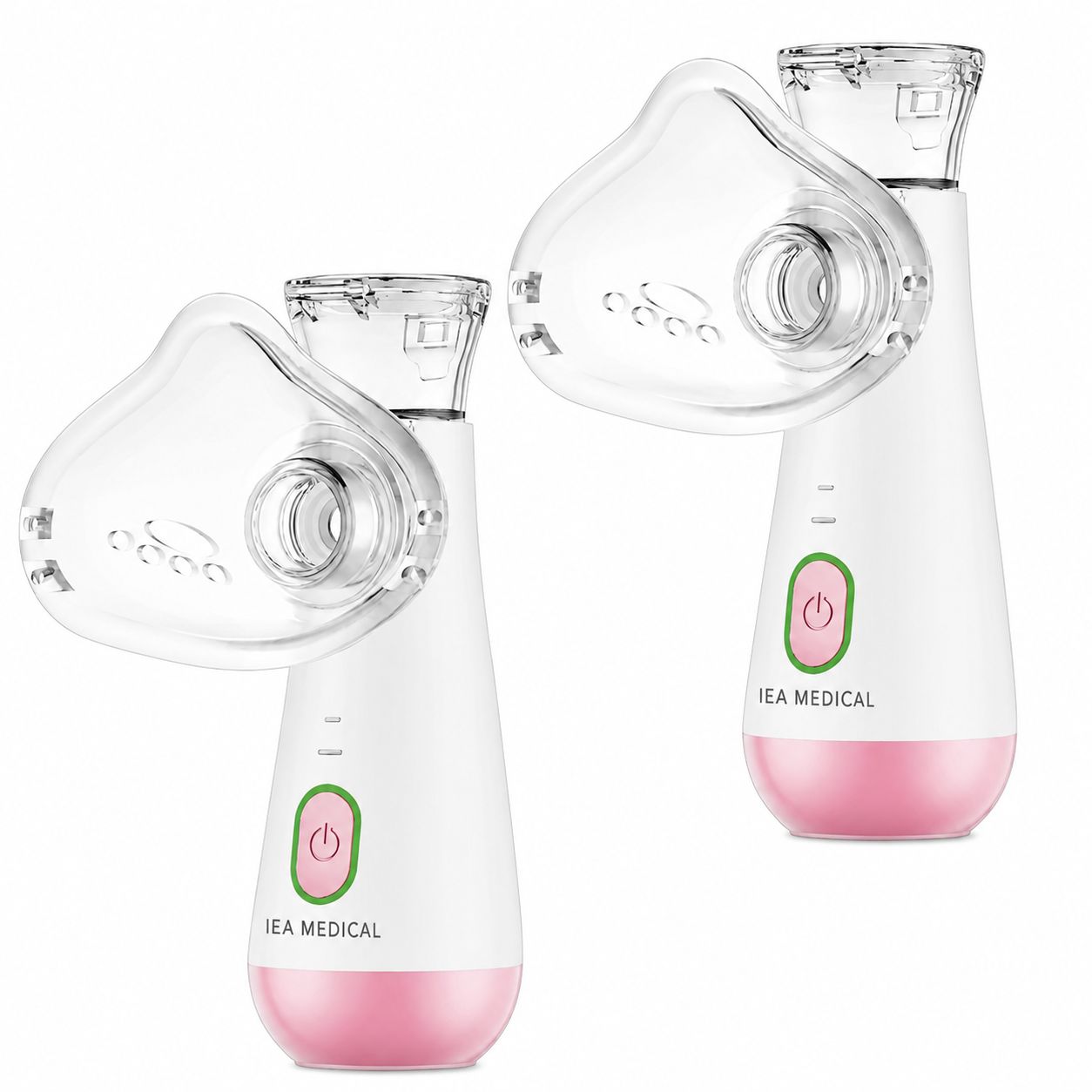 Zwei weiße Inhalatoren mit rosa Boden und durchsichtigen Masken.