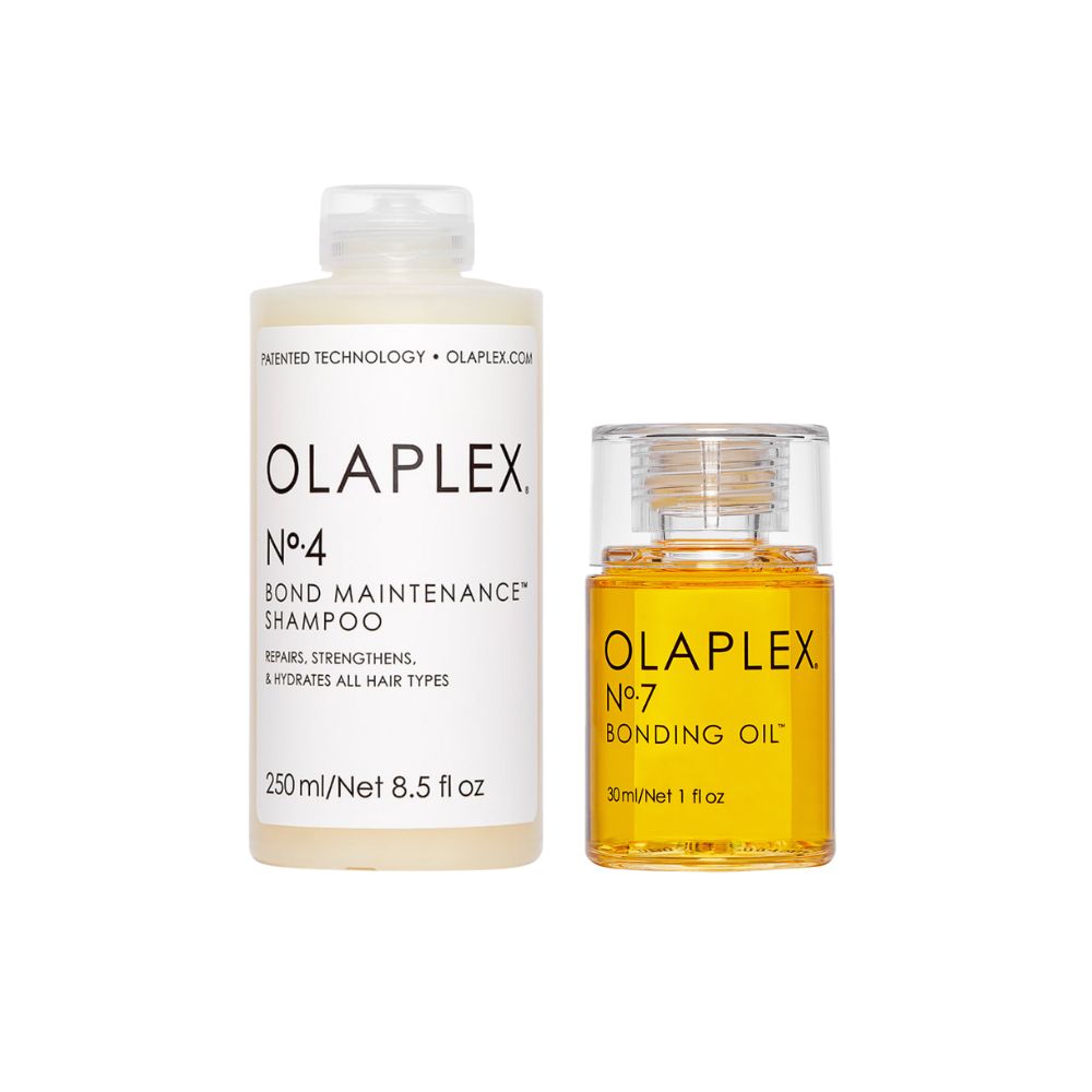 Zwei Haarpflegeprodukte: Shampoo und Öl. Shampoo-Flasche mit weißem Etikett, Ölflasche mit durchsichtigem Deckel.