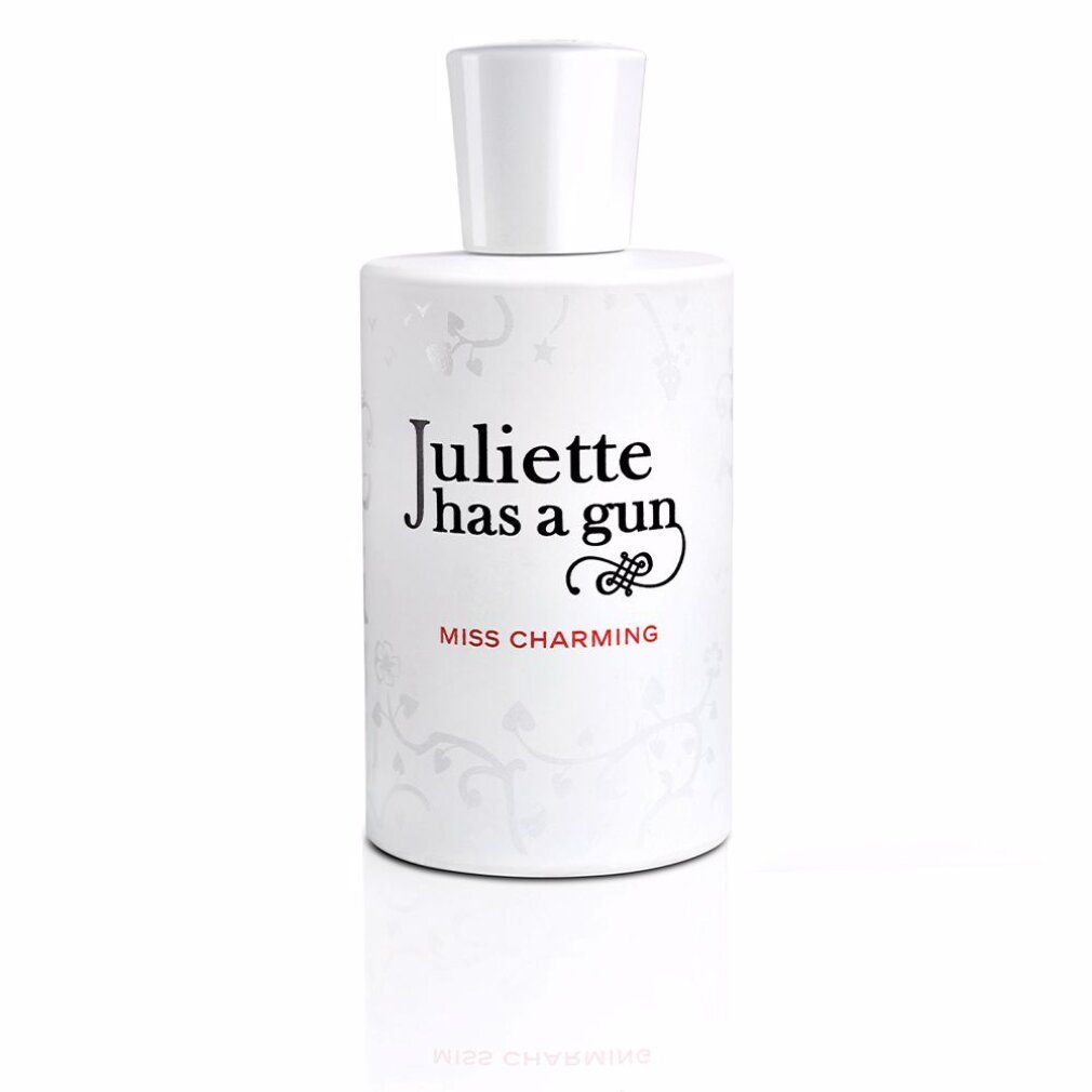 Weißes Parfümflakon. Aufschrift: Juliette has a gun, Miss Charming.