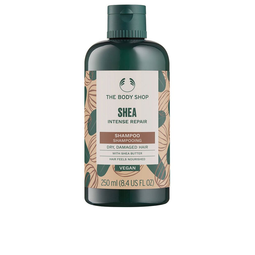 Grüne Shampoo-Flasche mit braunem Etikett. Aufschrift: Shea, Intense Repair, Shampoo, für trockenes, geschädigtes Haar. Vegan.
