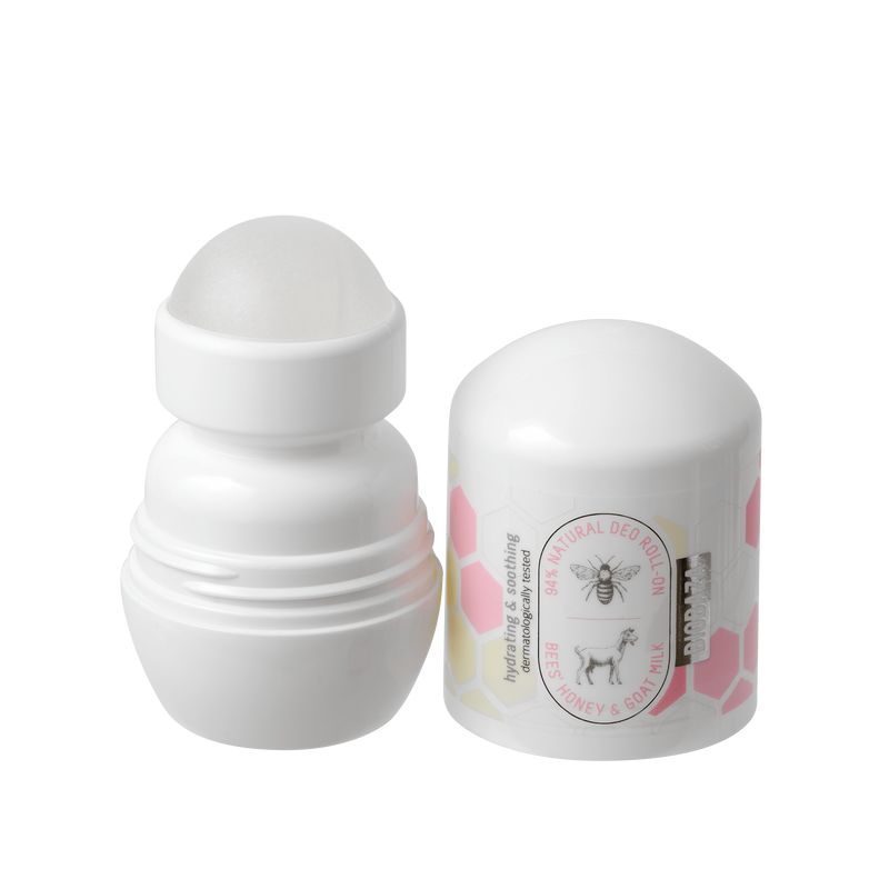 Weißer Roll-on-Deo mit geöffnetem Deckel. Aufschrift: Bienen und Ziegenmilch. Roll-on-Kopf sichtbar.