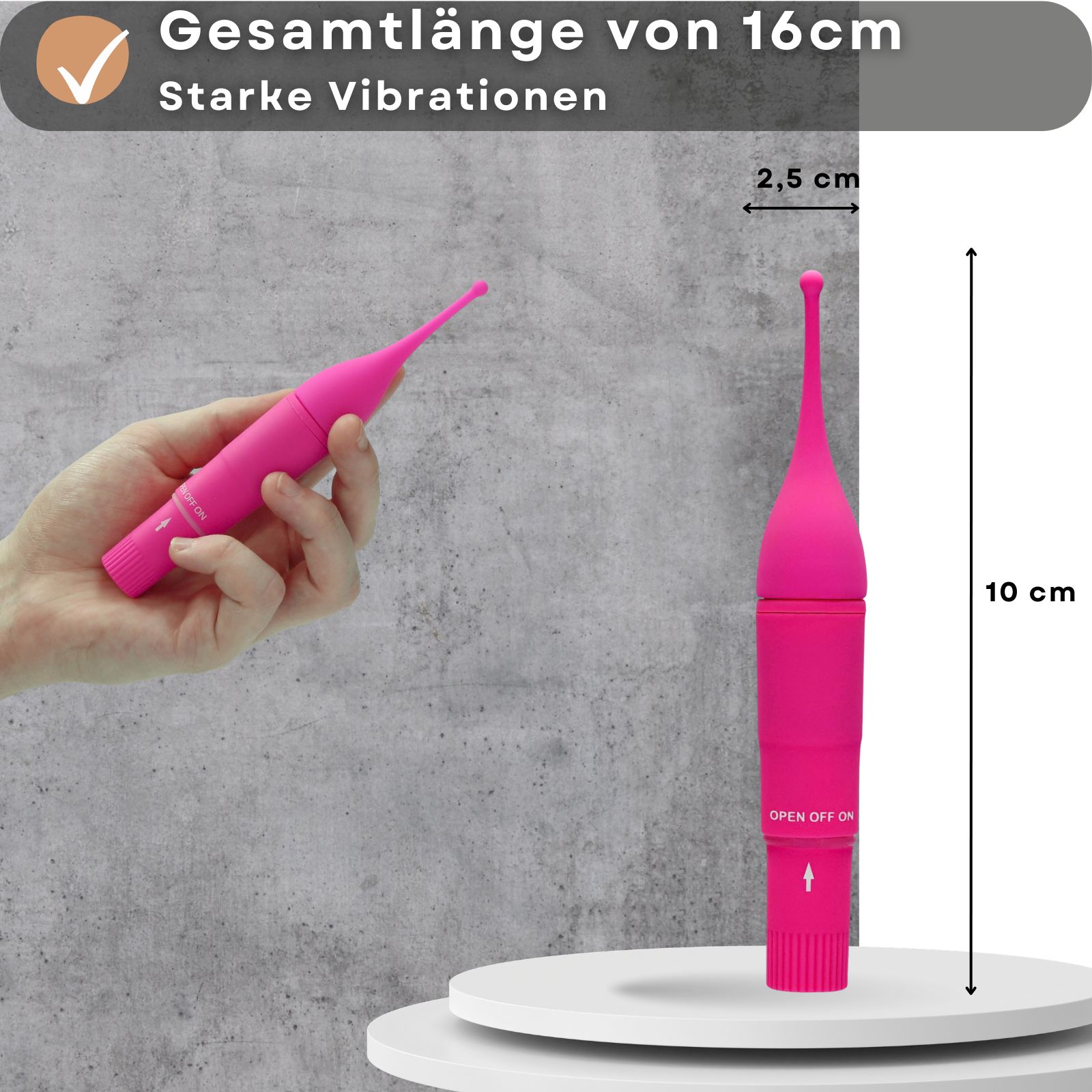 Pinkfarbener Vibrator und Hand. Maße: 10 cm hoch, 2,5 cm breit. Text: 16 cm Gesamtlänge.