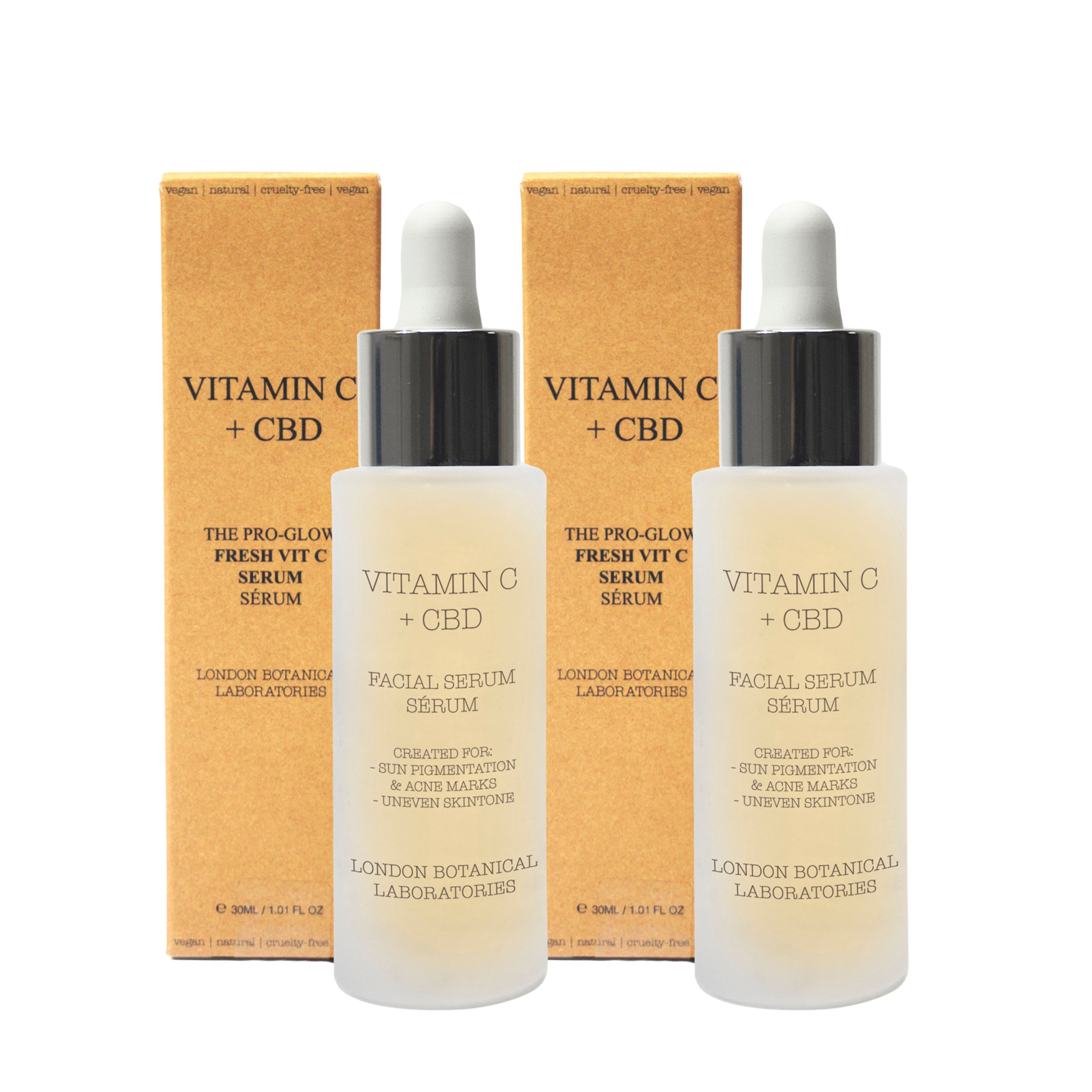 Zwei Serumflaschen mit Pipetten und zwei Kartons. Aufschrift: Vitamin C + CBD. Marke: London Botanical Laboratories. Text: Serum.