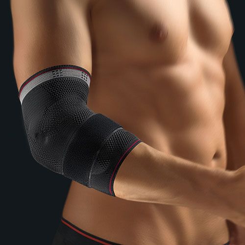 BORT select® EpiPlus® Gr. XXS schwarz. Ellbogenbandage, schwarz mit grauen und roten Akzenten. Am Arm getragen.