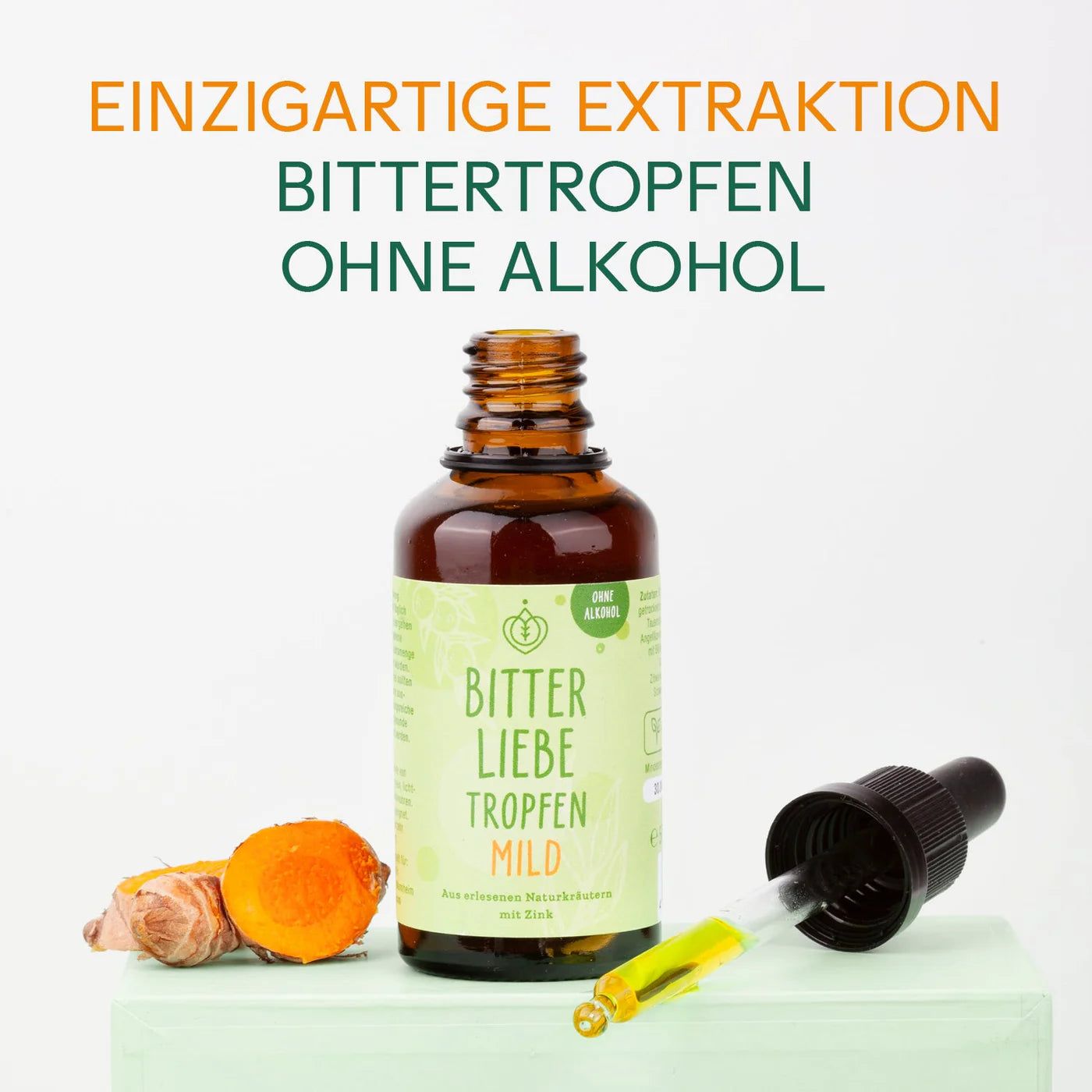Flasche BitterLiebe Tropfen mild mit Pipette und Ingwer. Text: Einzigartige Extraktion, Bittertropfen ohne Alkohol.